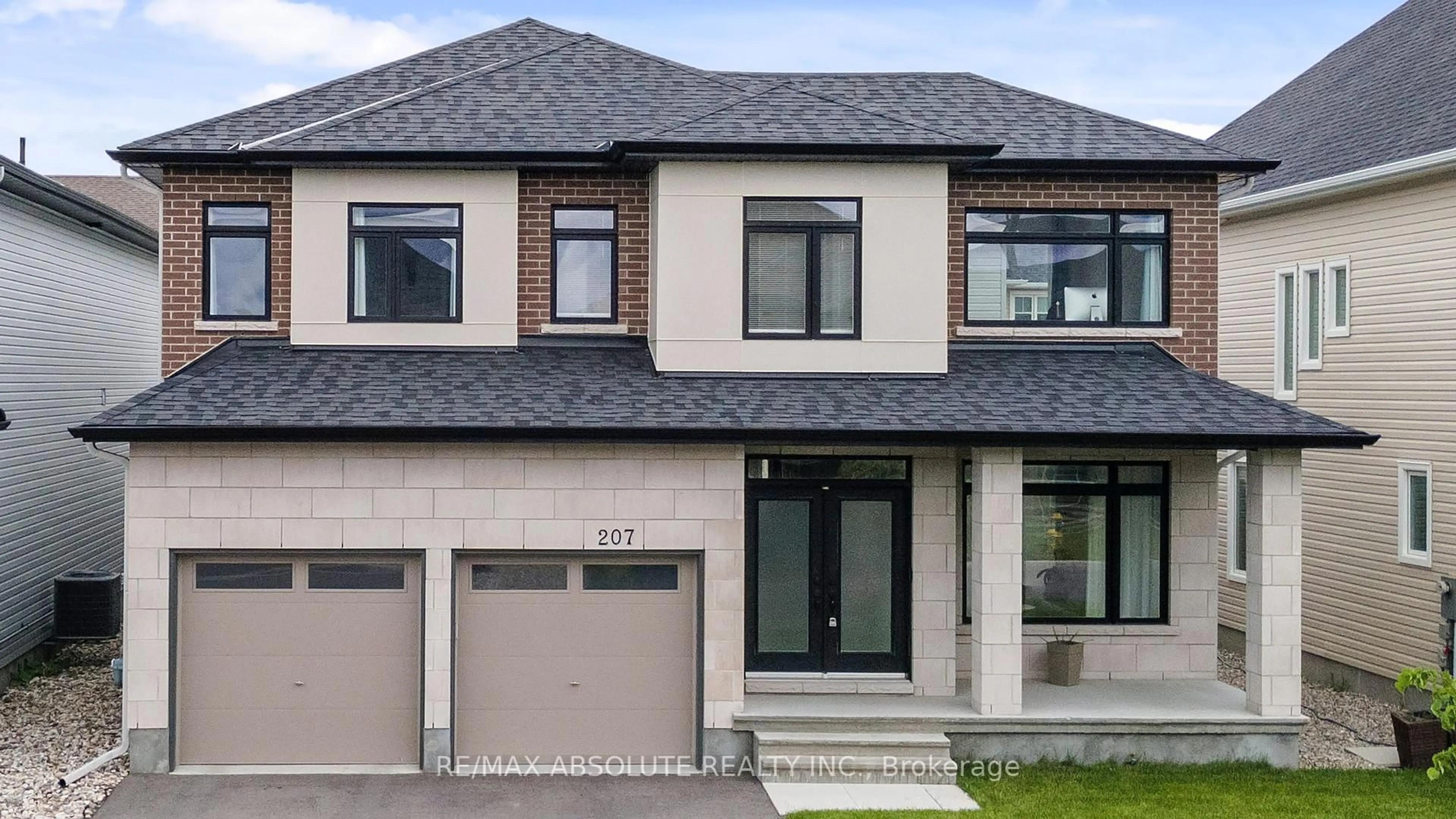 Home with brick exterior material, street for 207 Osterley Way, Ottawa Ontario K2S 2N6