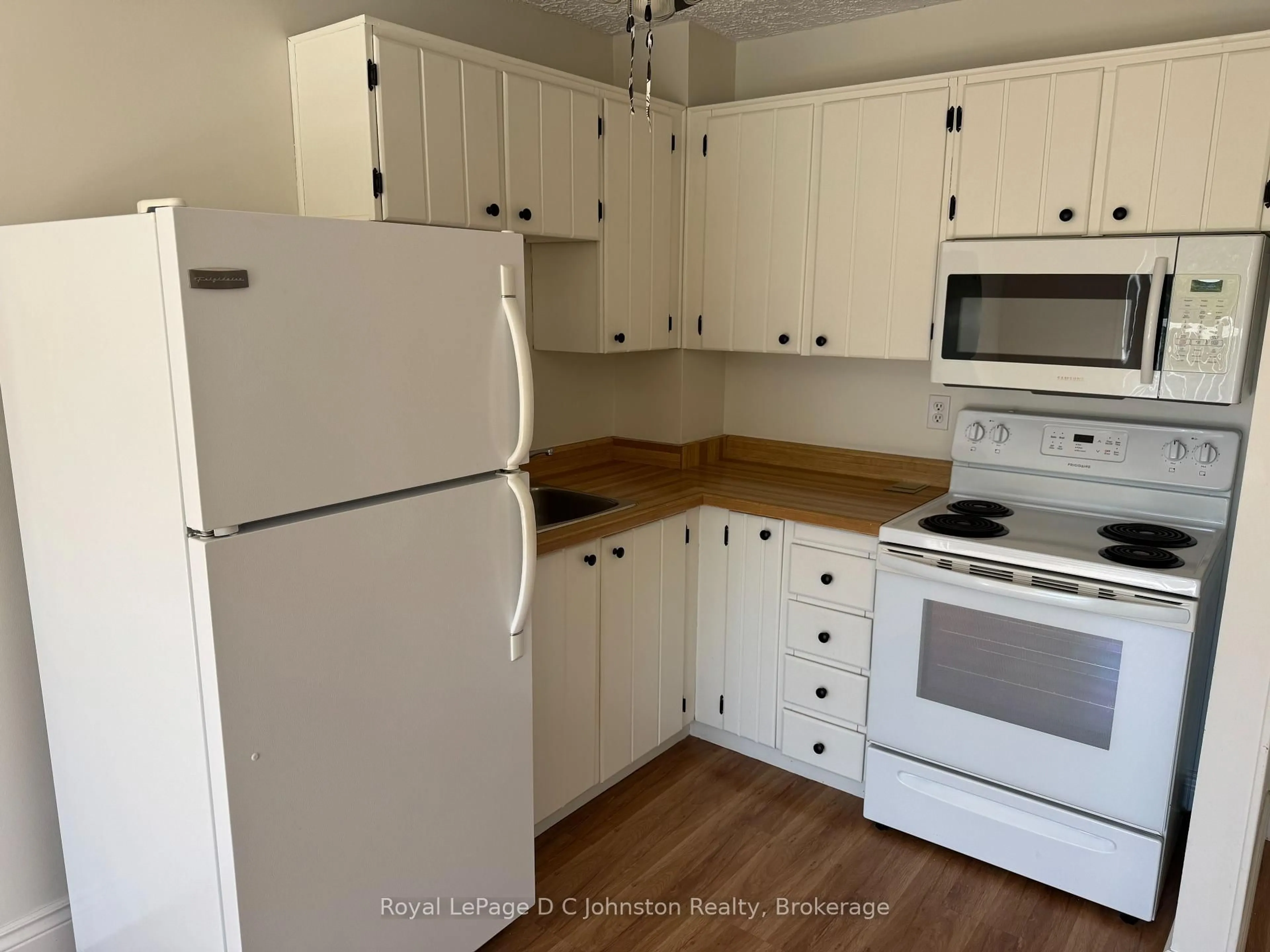 Standard kitchen, wood/laminate floor for 229 Adelaide St #303, Saugeen Shores Ontario N0H 2L0