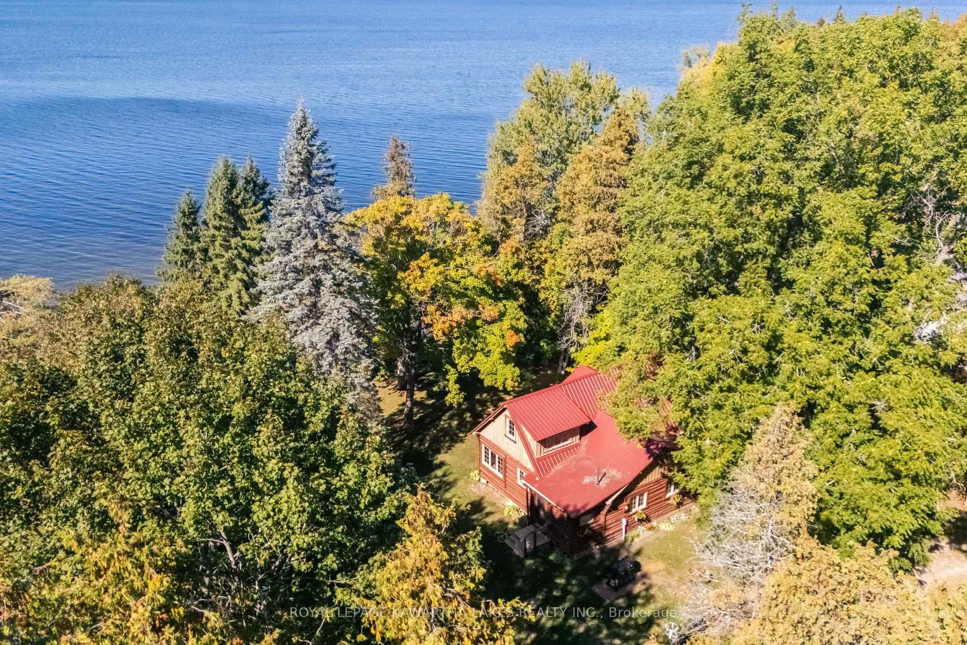 A pic from outside/outdoor area/front of a property/back of a property/a pic from drone, water/lake/river/ocean view for 54 Romany Ranch Rd, Kawartha Lakes Ontario K0M 1G0