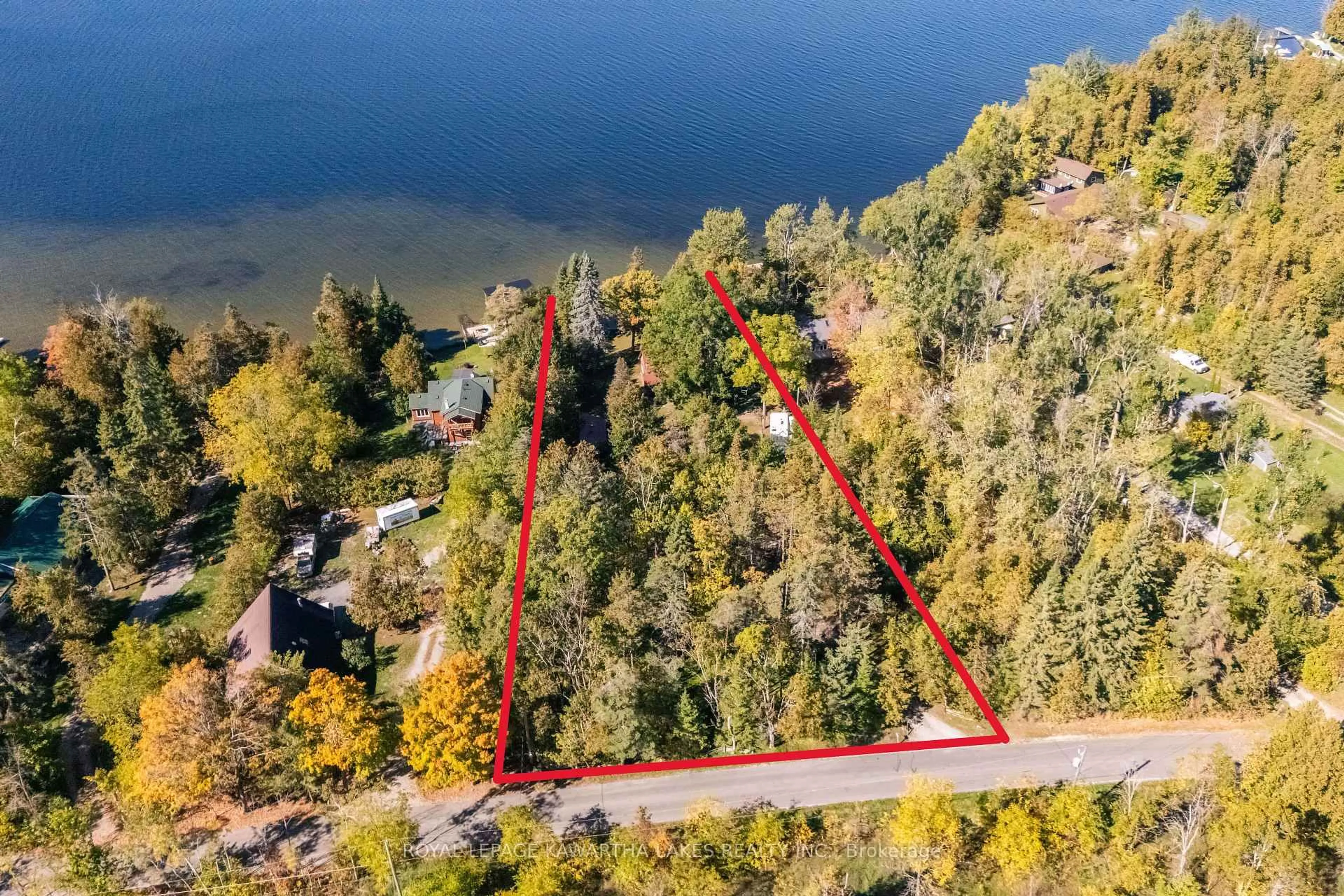 A pic from outside/outdoor area/front of a property/back of a property/a pic from drone, water/lake/river/ocean view for 54 Romany Ranch Rd, Kawartha Lakes Ontario K0M 1G0
