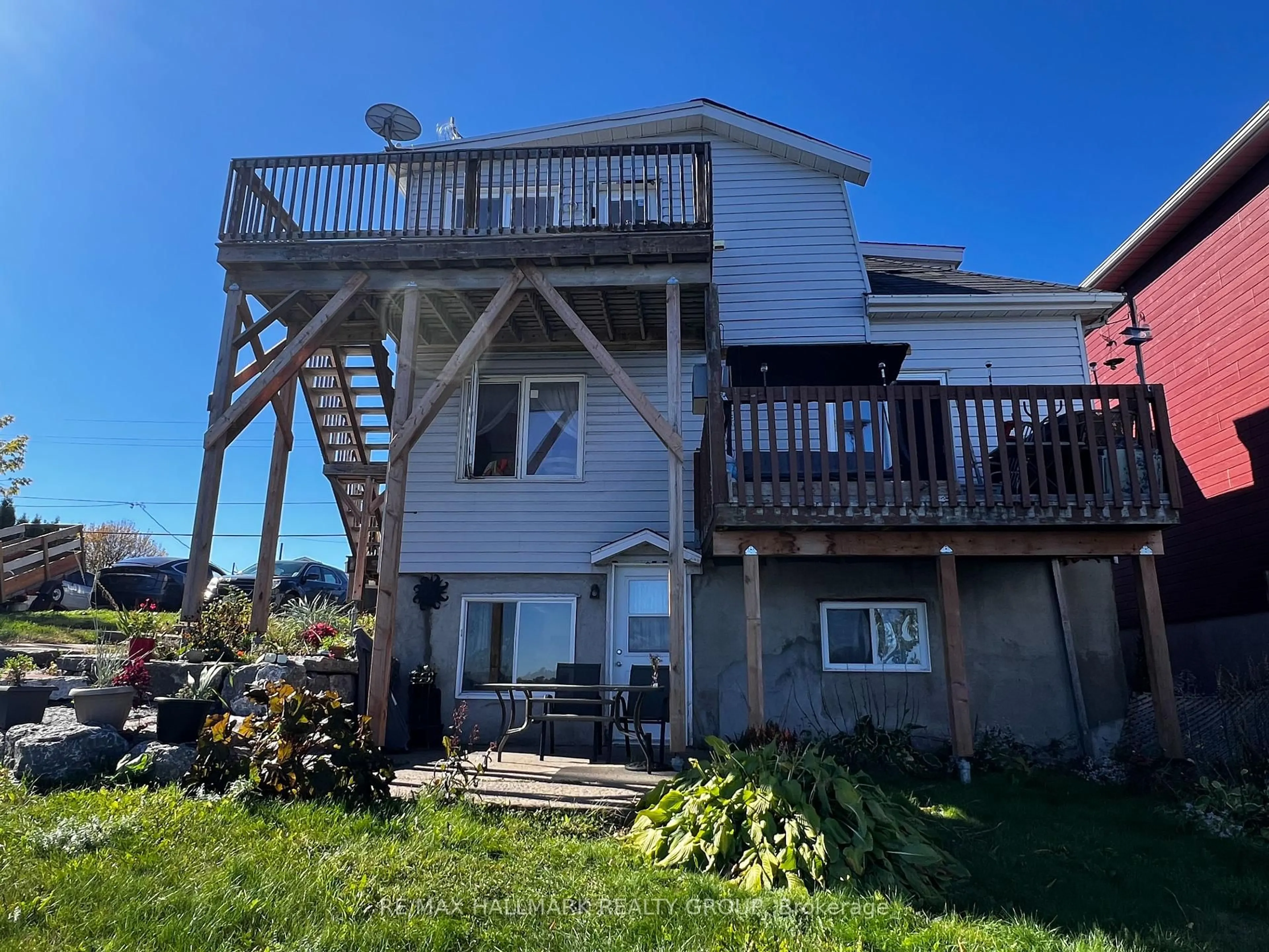 A pic from outside/outdoor area/front of a property/back of a property/a pic from drone, water/lake/river/ocean view for 1109-1111 Main St, Hawkesbury Ontario K6A 1B8