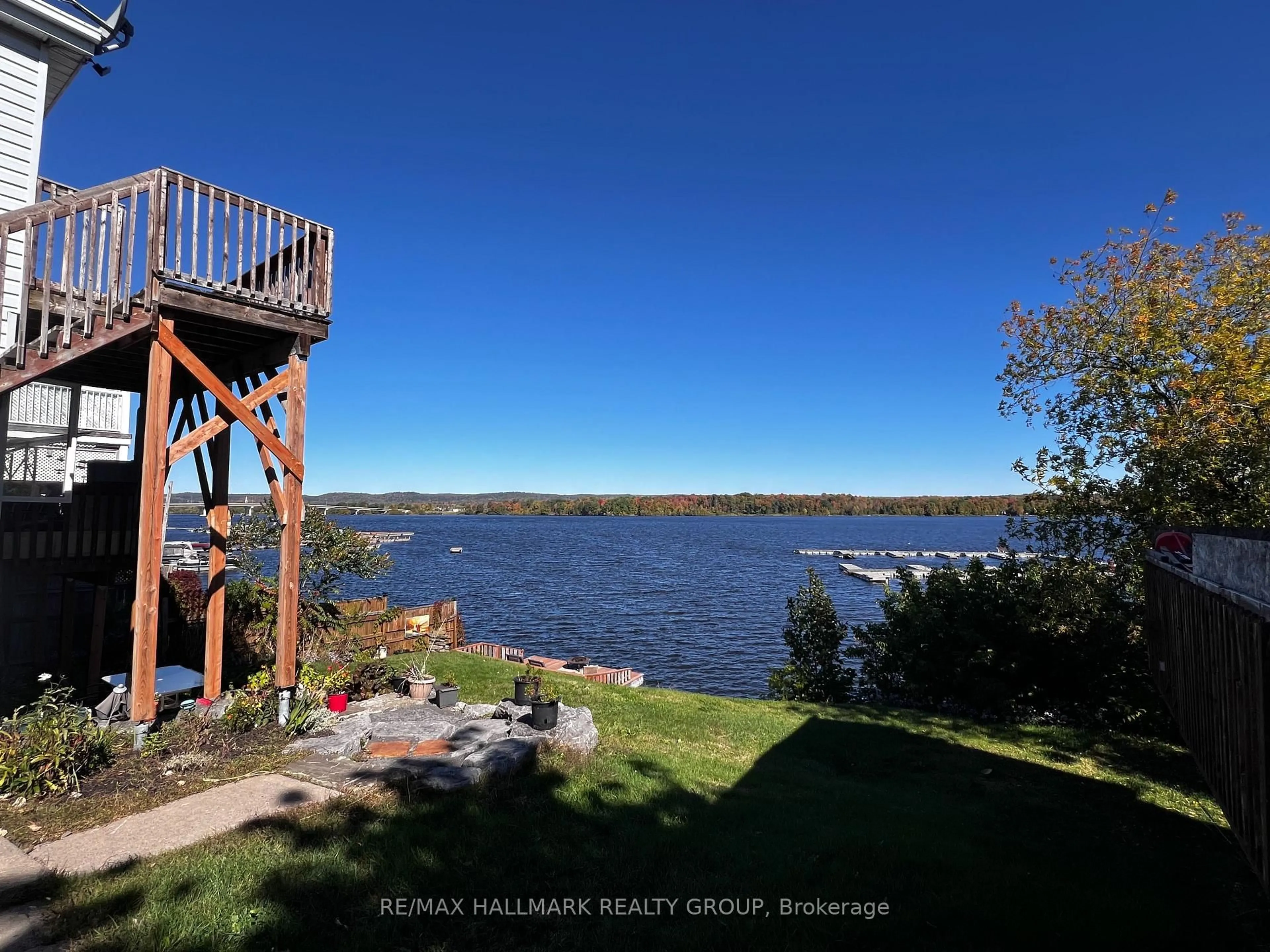 A pic from outside/outdoor area/front of a property/back of a property/a pic from drone, water/lake/river/ocean view for 1109-1111 Main St, Hawkesbury Ontario K6A 1B8