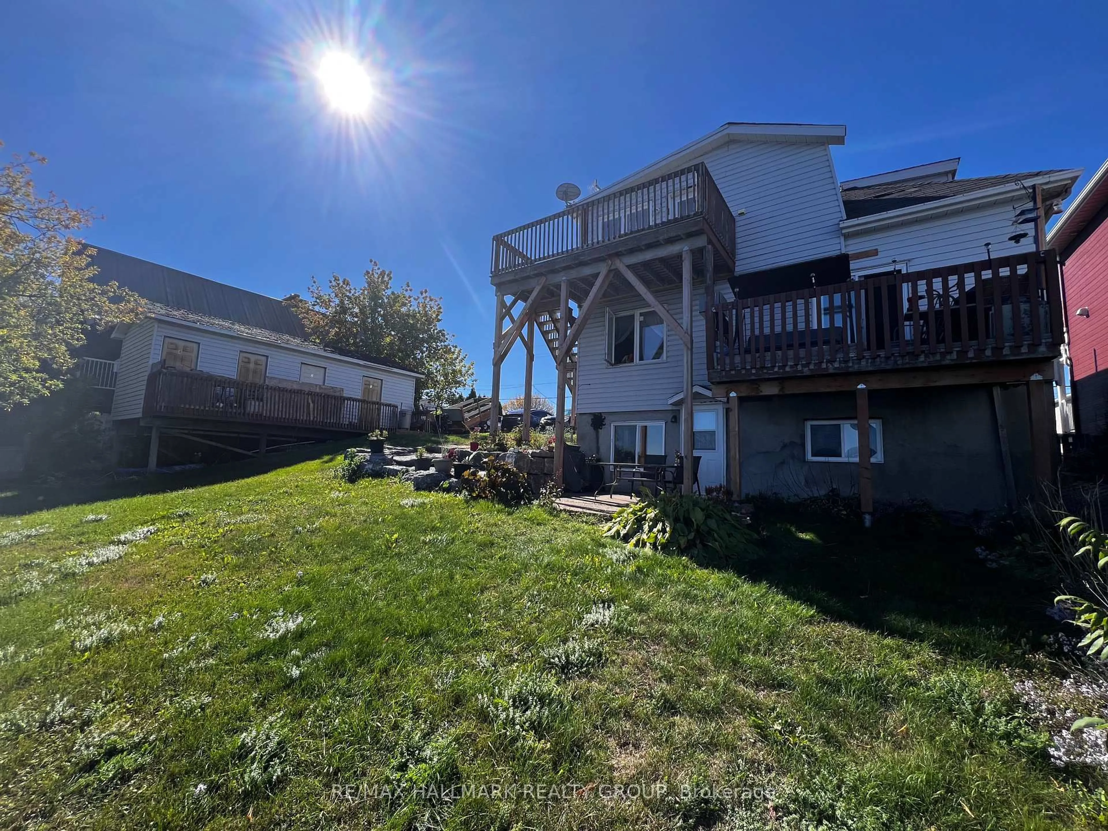 A pic from outside/outdoor area/front of a property/back of a property/a pic from drone, water/lake/river/ocean view for 1109-1111 Main St, Hawkesbury Ontario K6A 1B8