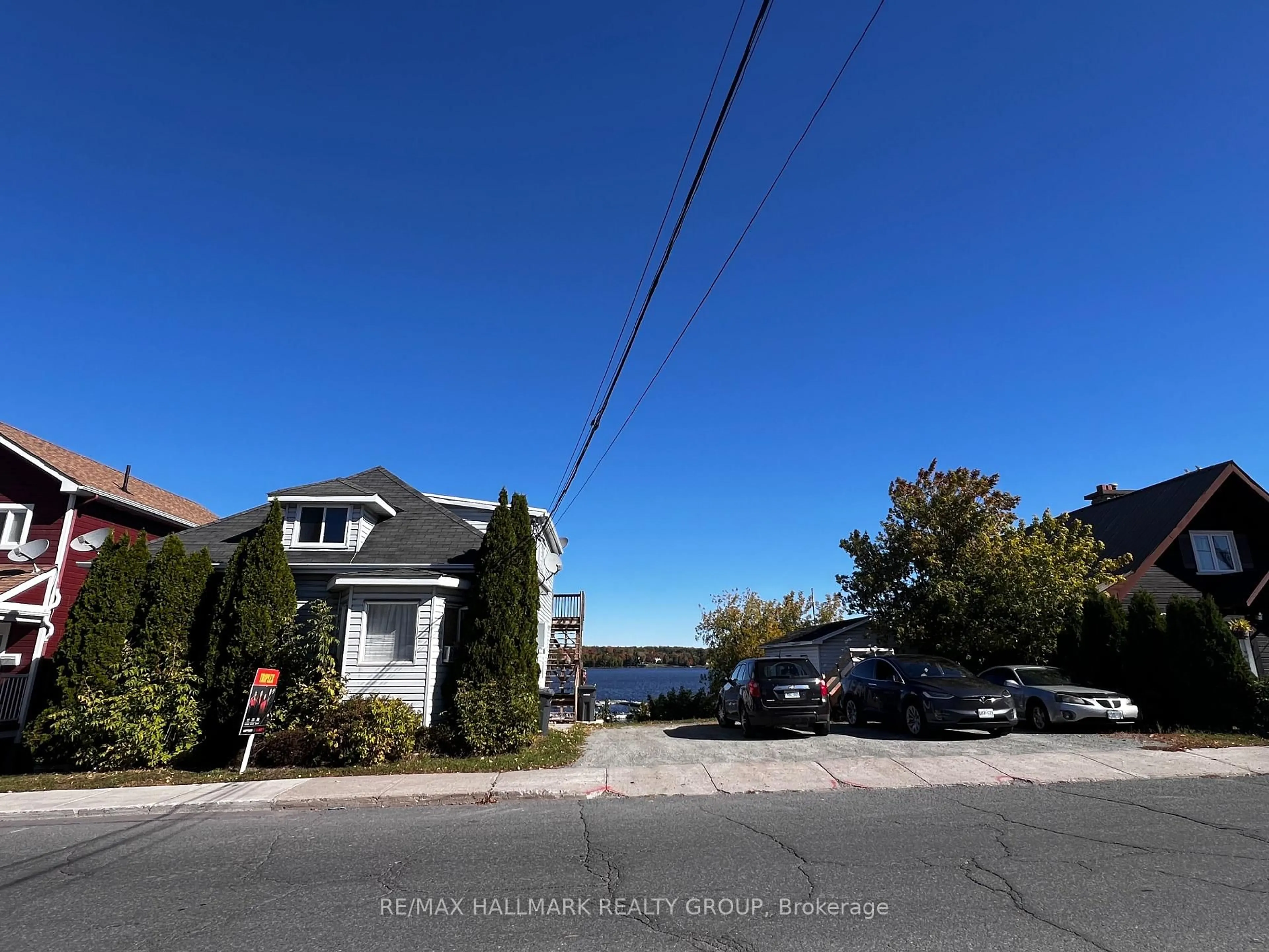 A pic from outside/outdoor area/front of a property/back of a property/a pic from drone, water/lake/river/ocean view for 1109-1111 Main St, Hawkesbury Ontario K6A 1B8