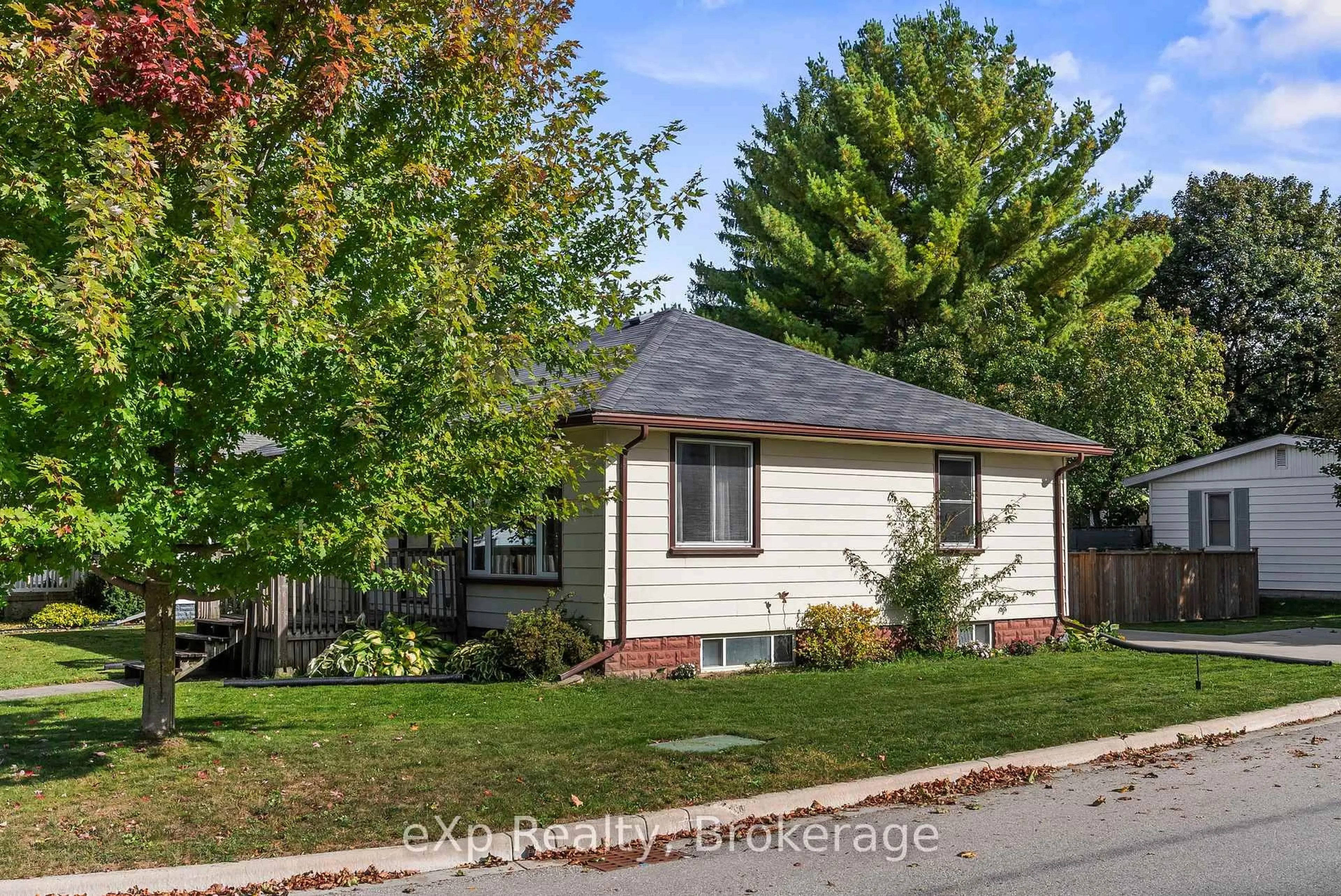 Home with vinyl exterior material, street for 380 JAMES St, Wellington North Ontario N0G 2L3