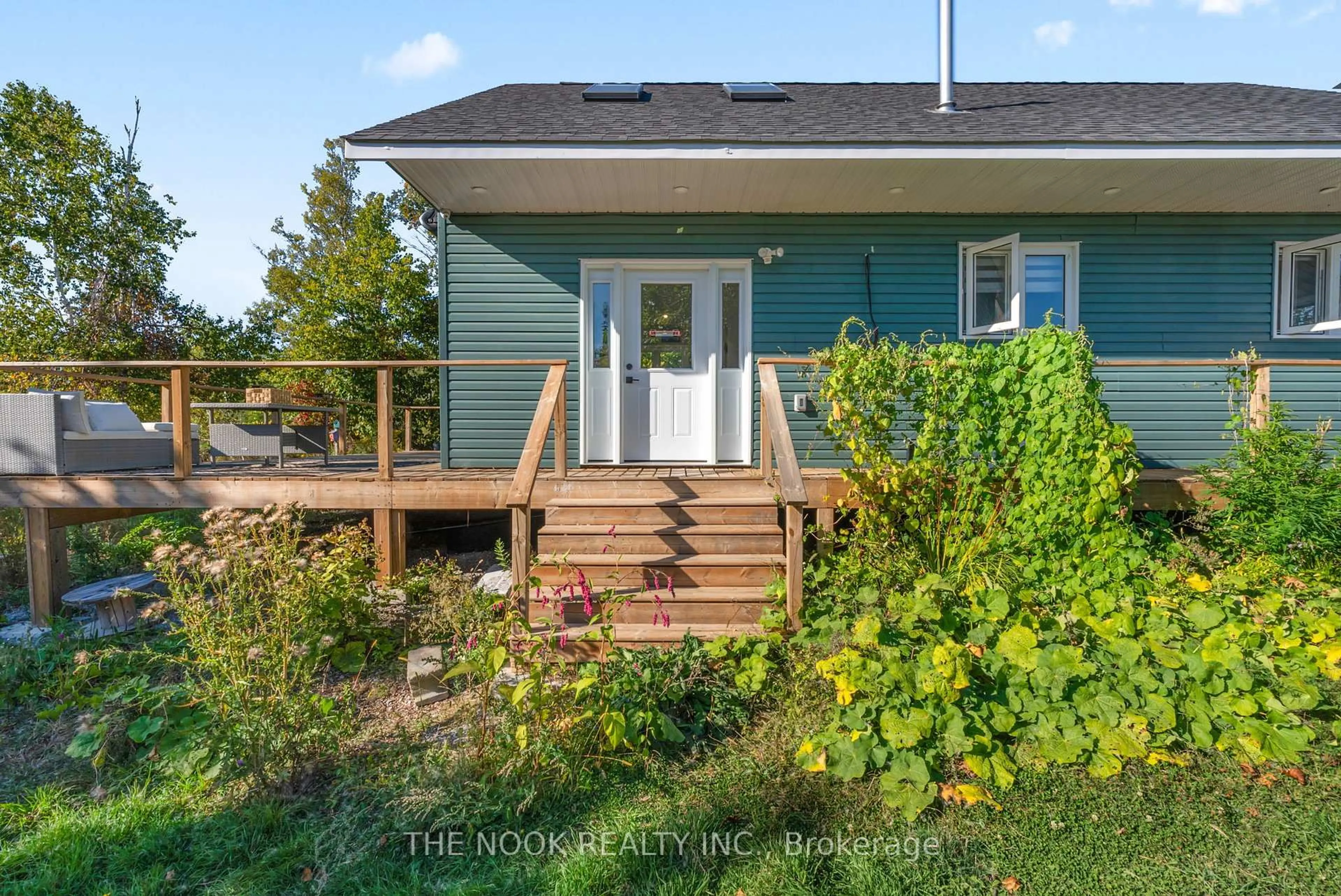 Home with vinyl exterior material, street for 46 Mcguire Beach Rd, Kawartha Lakes Ontario K0M 2B0