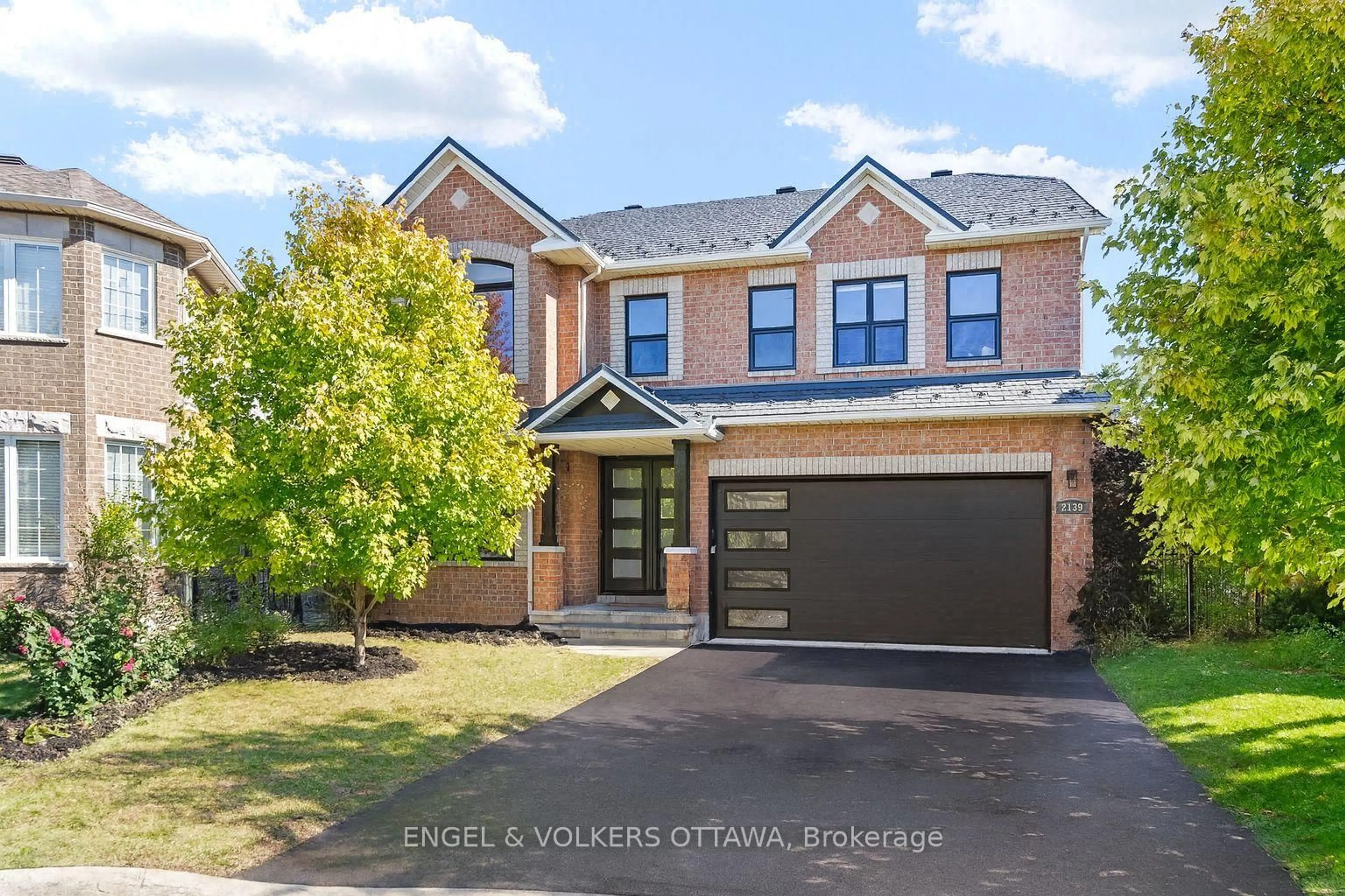 Home with brick exterior material, street for 2139 Blue Willow Cres, Ottawa Ontario K1W 1K5