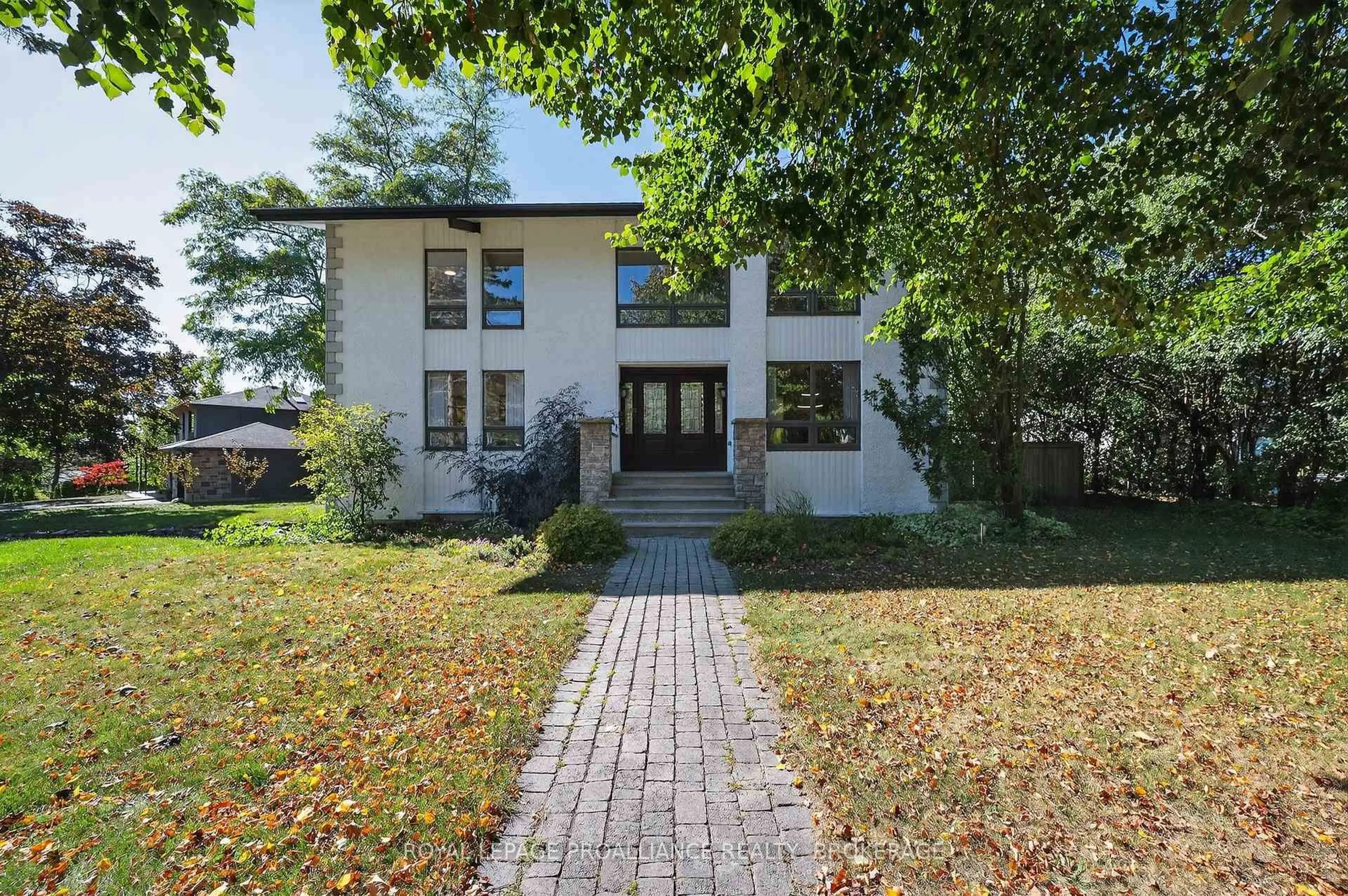 Home with brick exterior material, street for 202 Alwington Pl, Kingston Ontario K7L 4P8