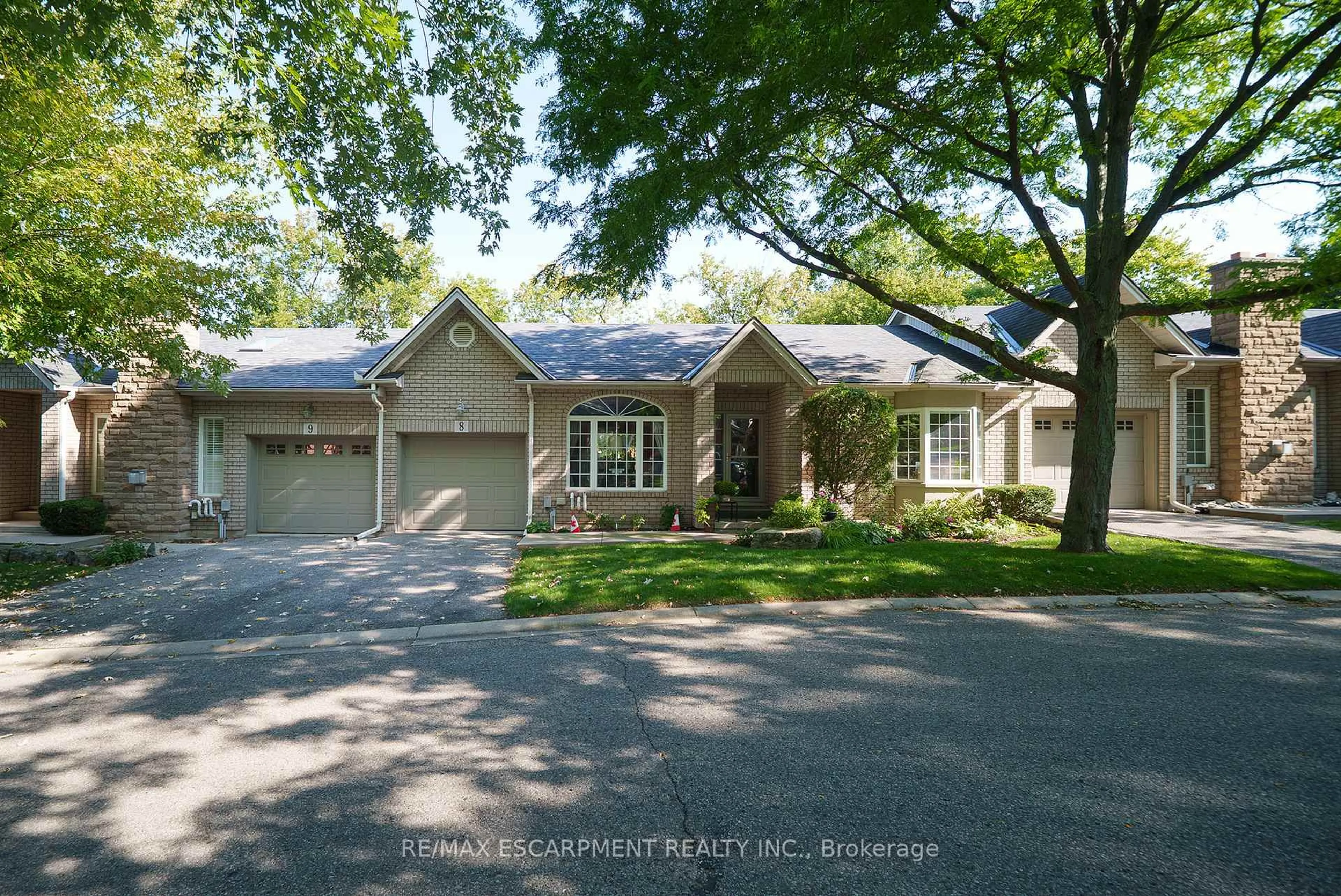 Home with brick exterior material, street for 24 Hardy Rd #8, Brantford Ontario N3T 5K6
