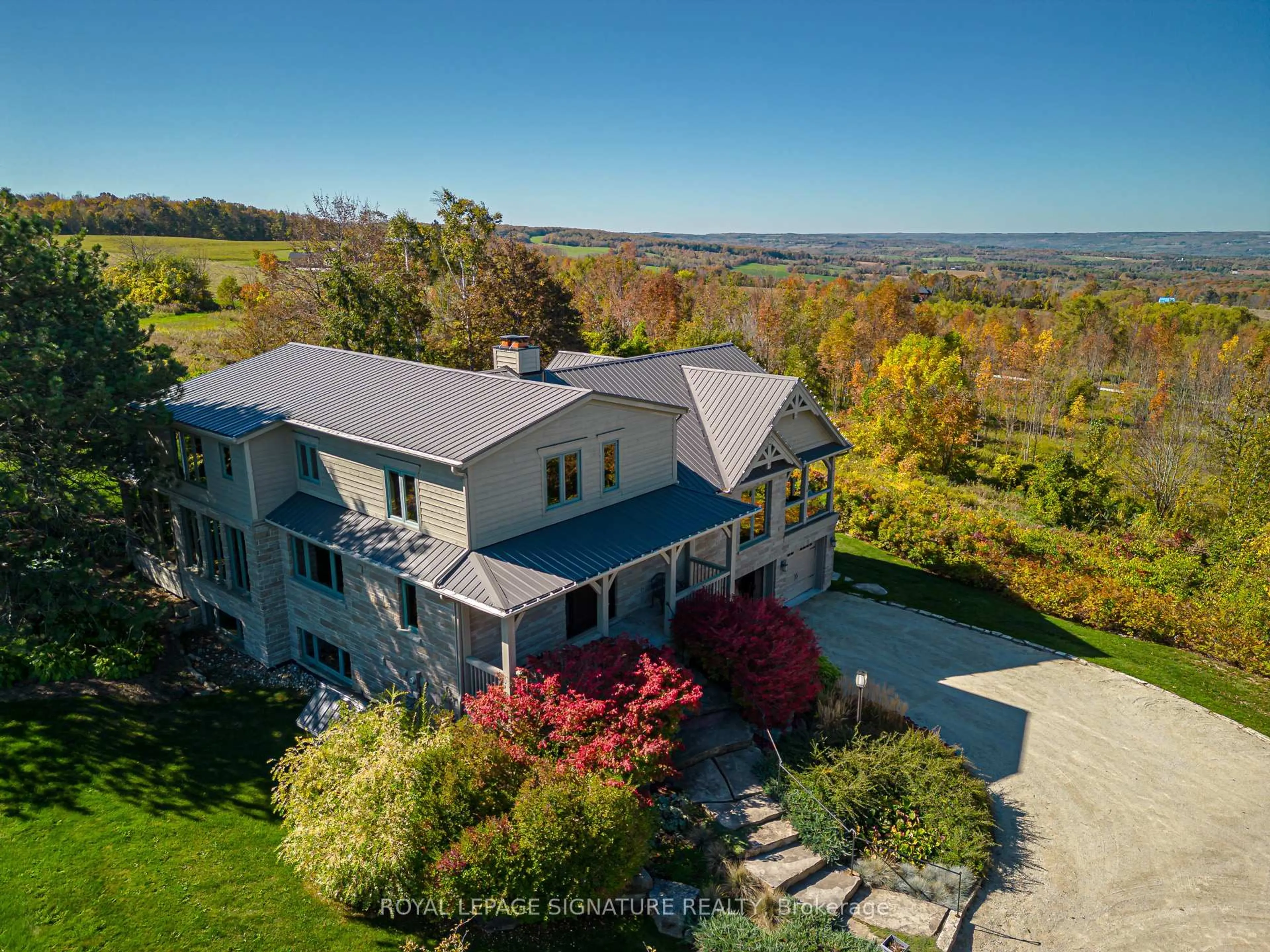 A pic from outside/outdoor area/front of a property/back of a property/a pic from drone, unknown for 608450 12th Sdrd, Blue Mountains Ontario N0H 2E0