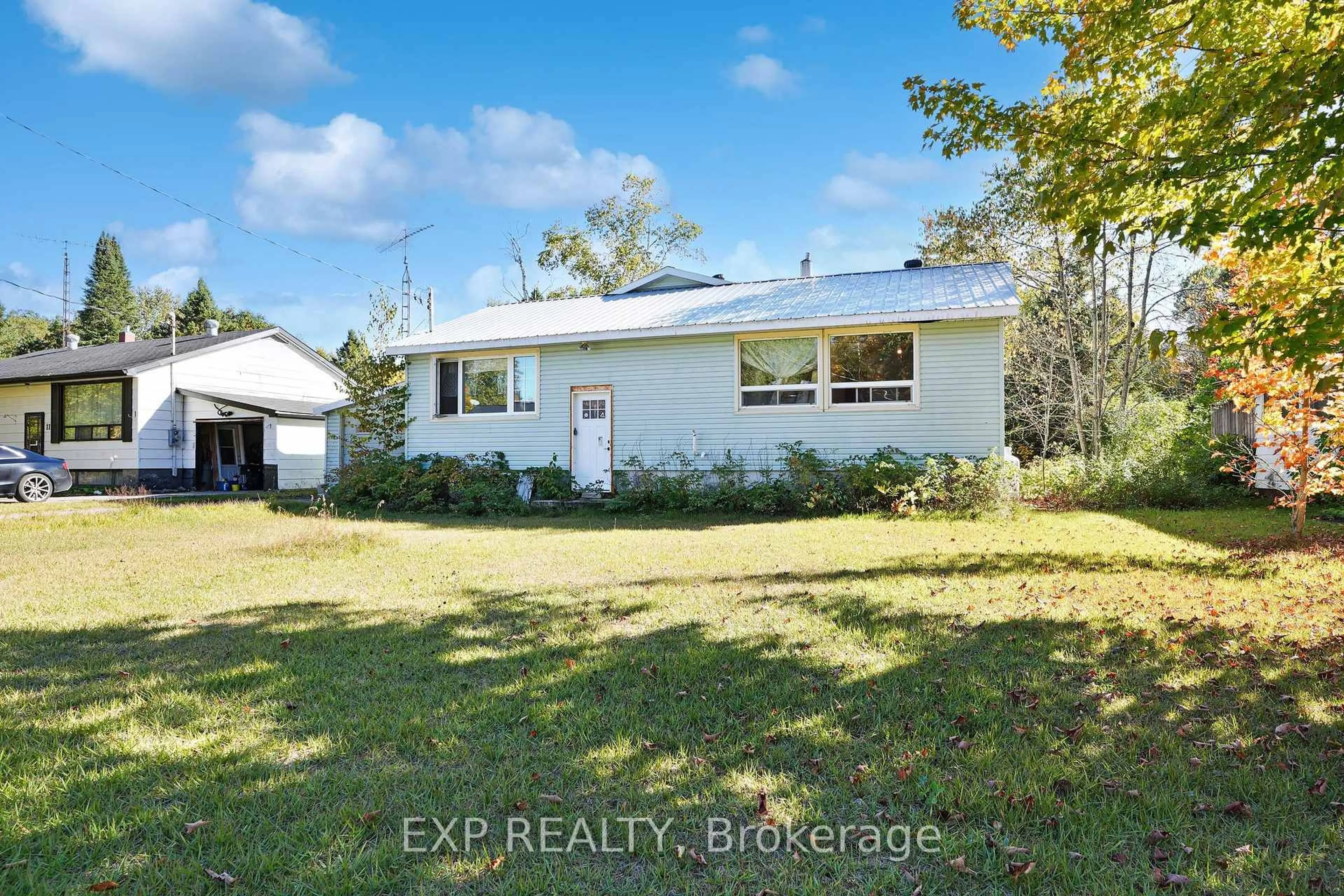 A pic from outside/outdoor area/front of a property/back of a property/a pic from drone, unknown for 1043 Estates Rd, Highlands East Ontario K0L 1C0