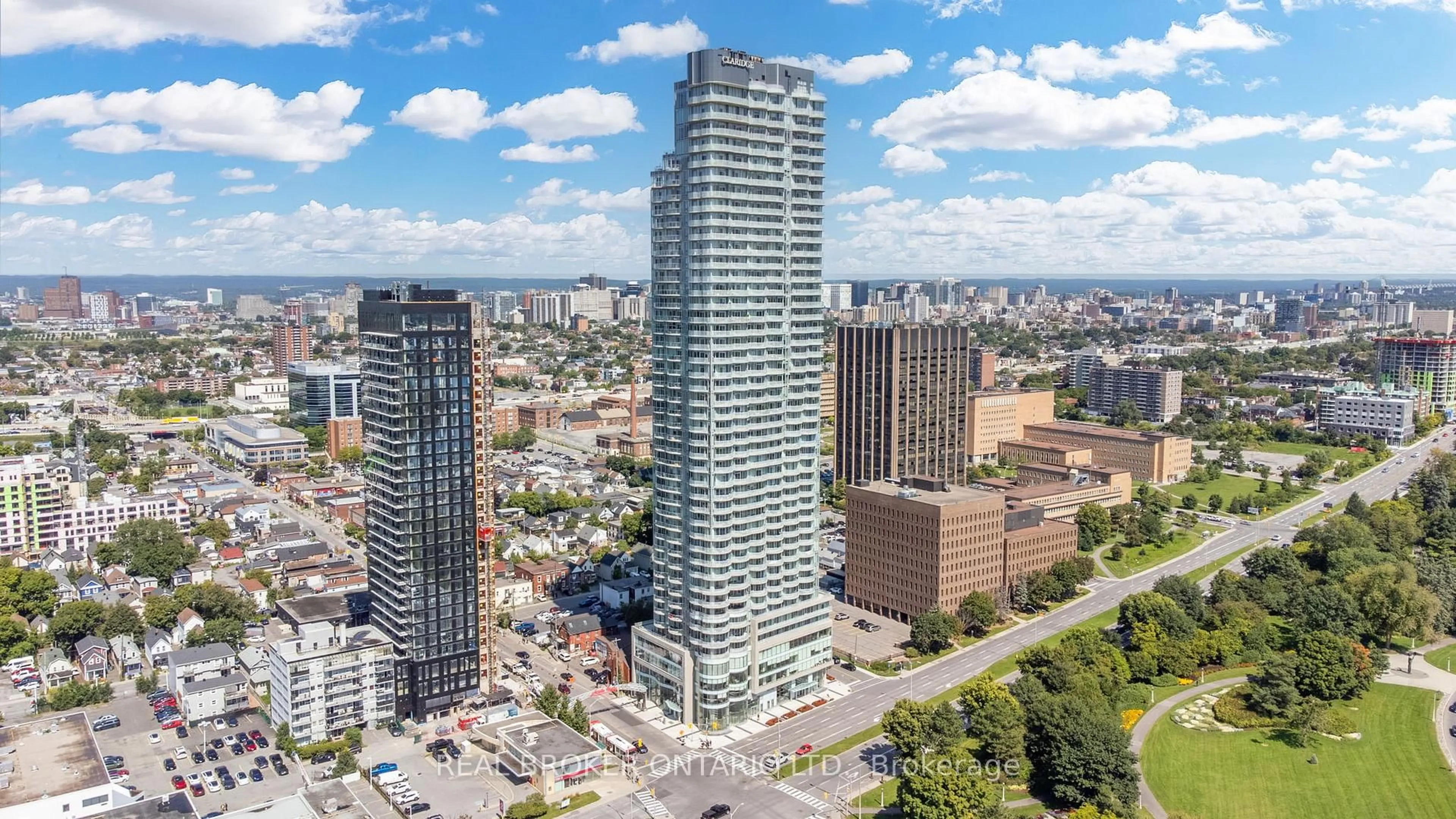 A pic from outside/outdoor area/front of a property/back of a property/a pic from drone, city buildings view from balcony for 805 Carling Ave #802, Ottawa Ontario K1S 5W9