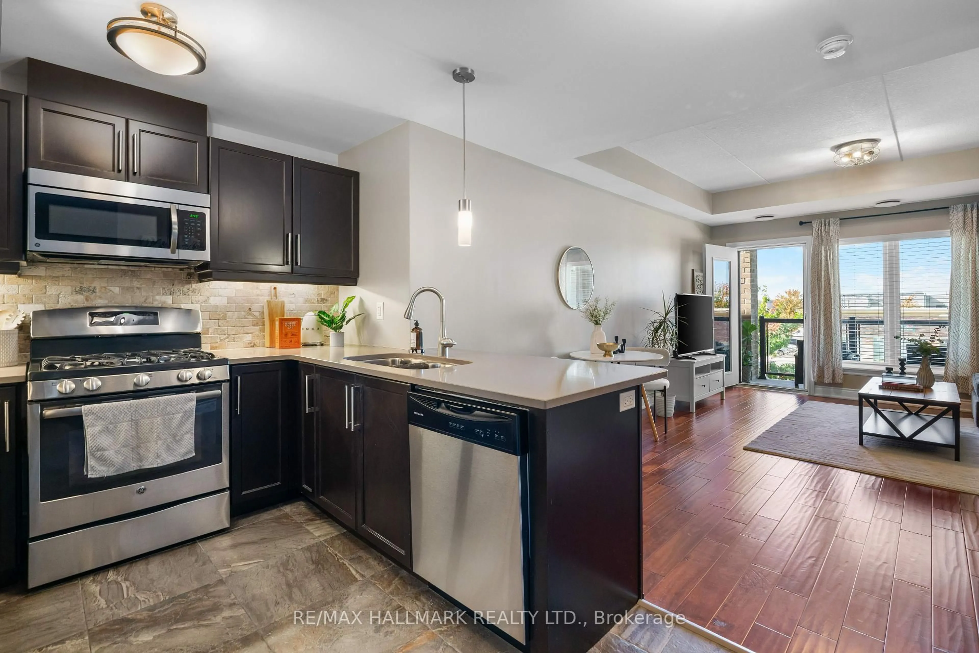 Open concept kitchen, ceramic/tile floor for 106 Bard Blvd #302, Guelph Ontario N1L 0L8