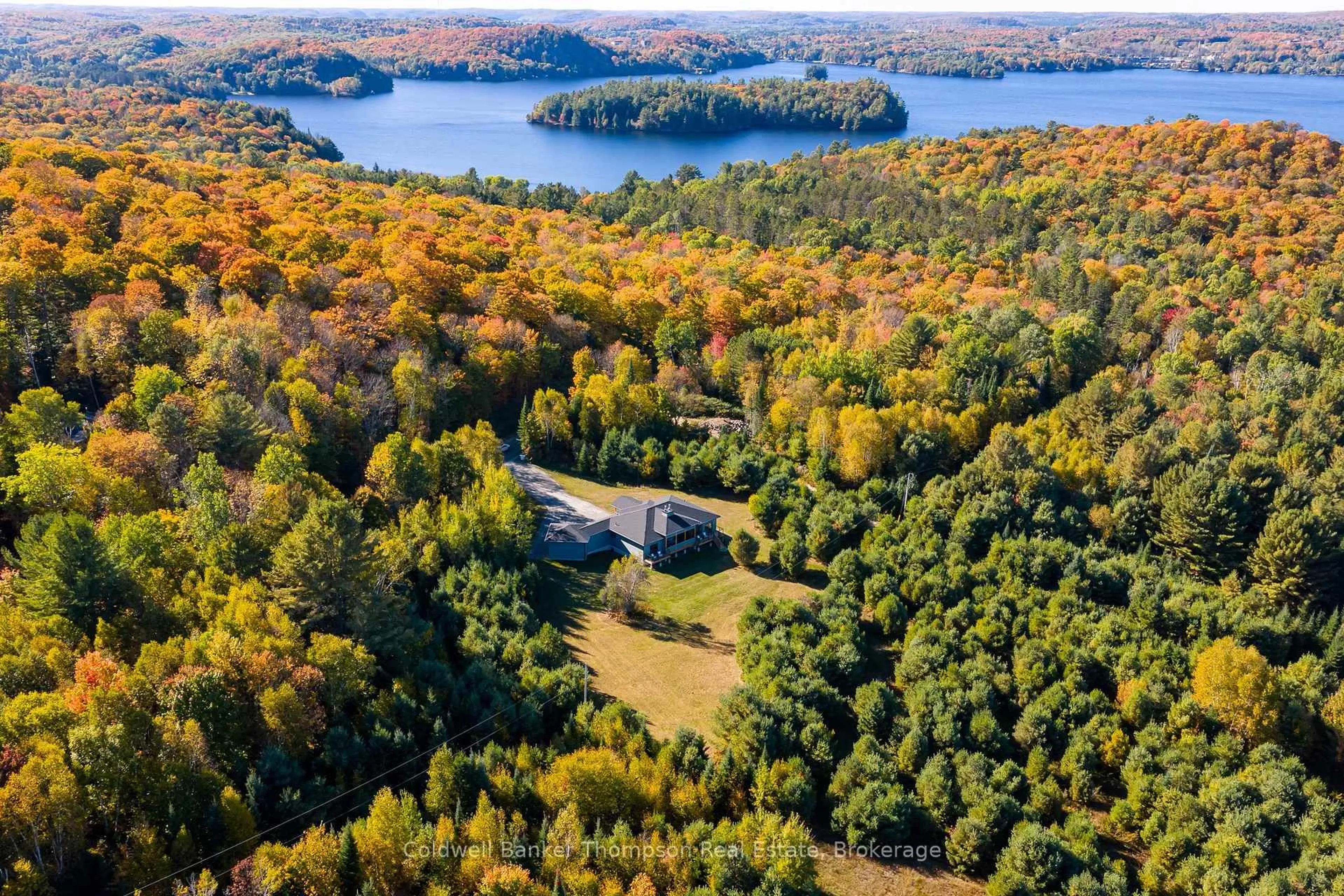 A pic from outside/outdoor area/front of a property/back of a property/a pic from drone, water/lake/river/ocean view for 175 Springfield Rd, Huntsville Ontario P1H 0A5