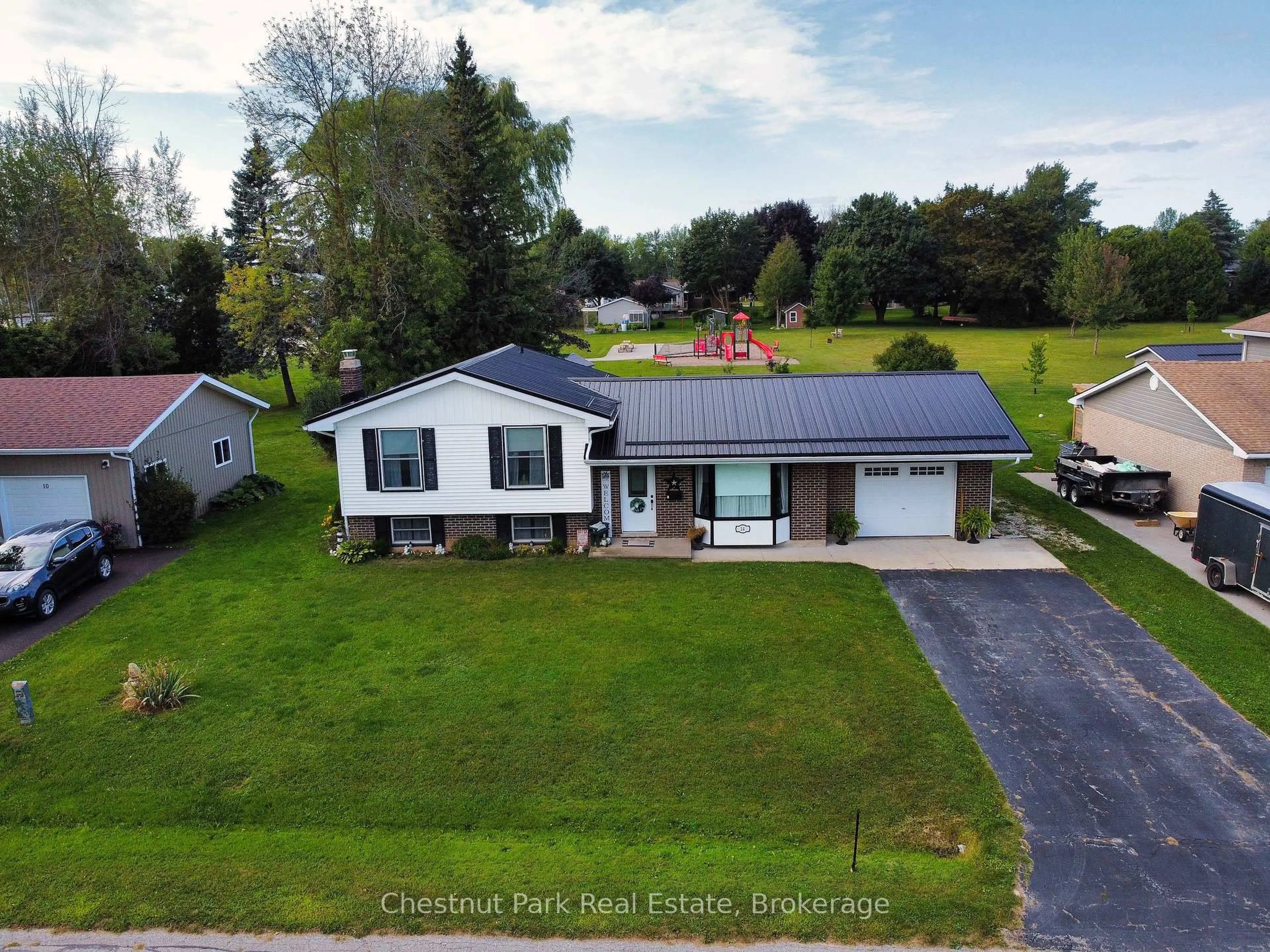 A pic from outside/outdoor area/front of a property/back of a property/a pic from drone, street for 14 Tower Rd, Arran-Elderslie Ontario N0G 1L0