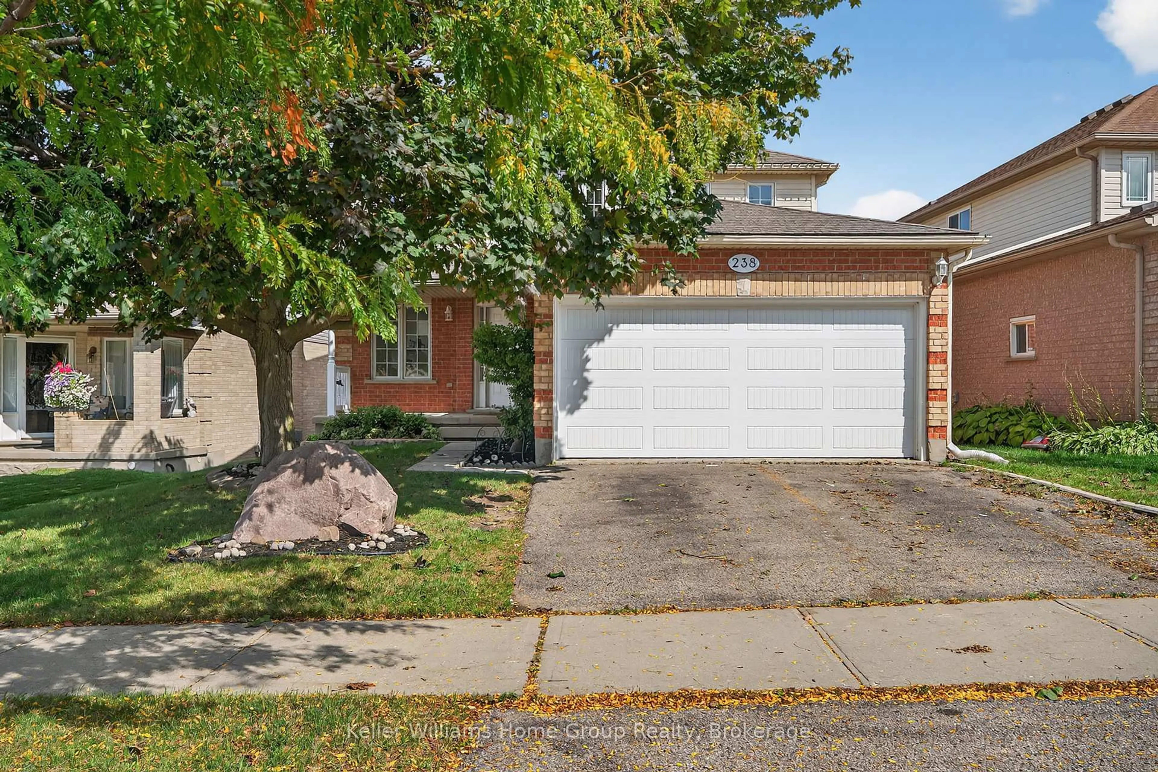 Home with brick exterior material, street for 238 Briarmeadow Dr, Kitchener Ontario N2A 4C4