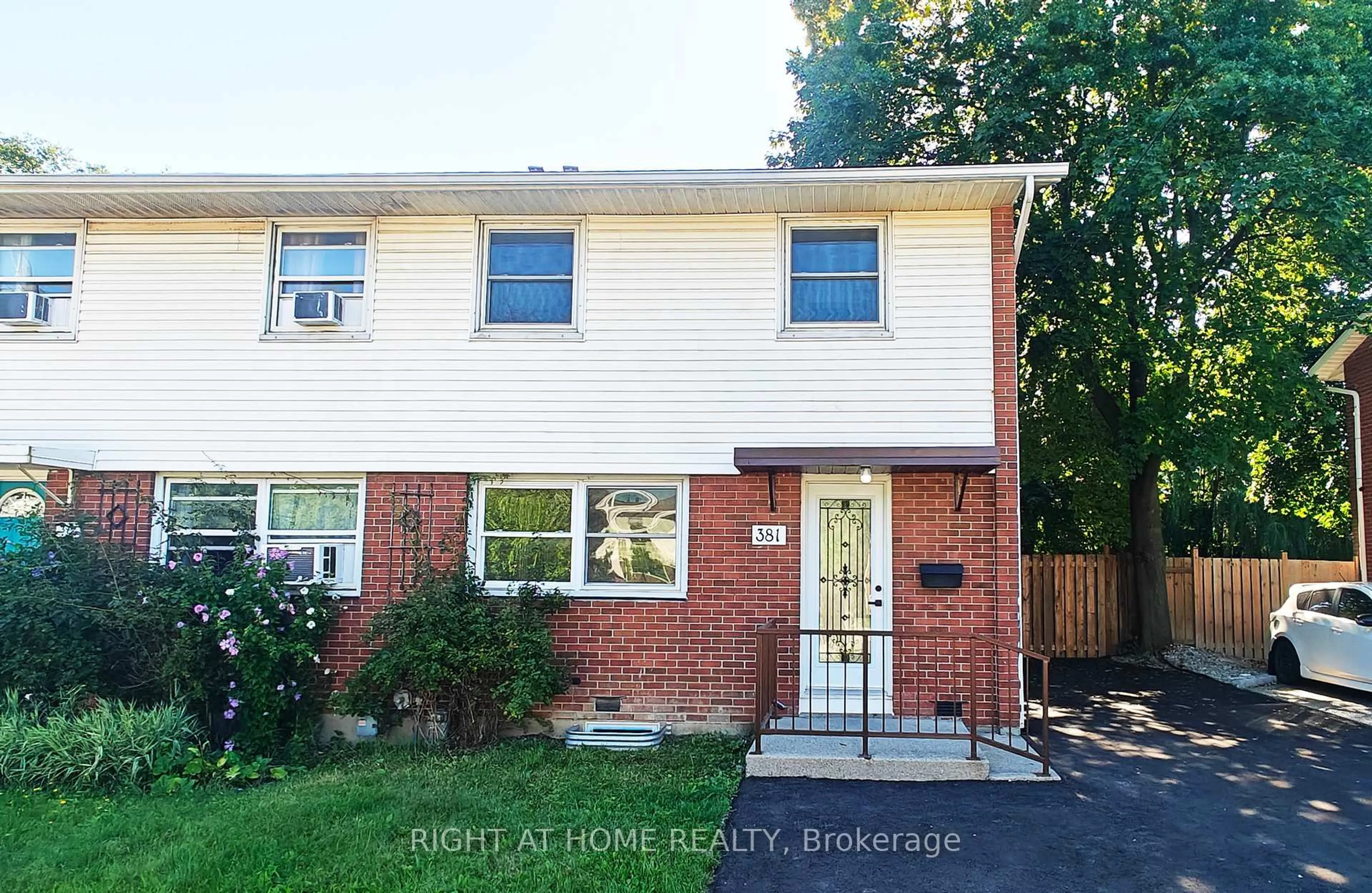 Home with brick exterior material, street for 381 East 23rd St, Hamilton Ontario L8V 2X5