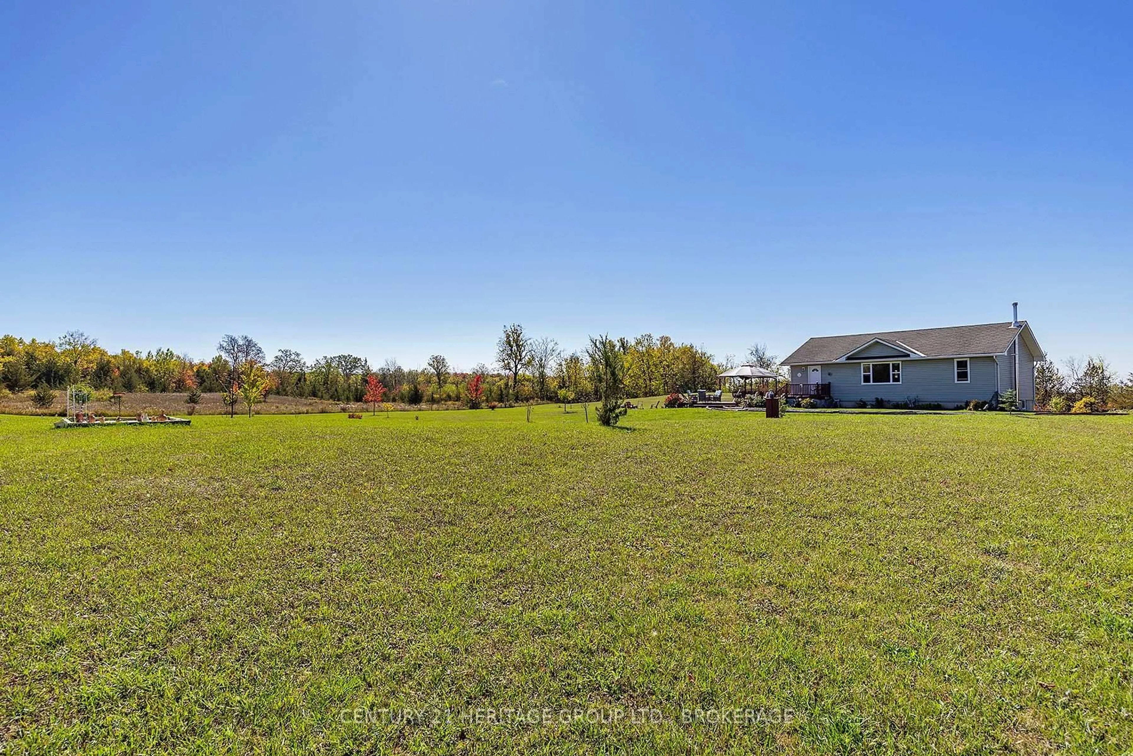 A pic from outside/outdoor area/front of a property/back of a property/a pic from drone, water/lake/river/ocean view for 920 Frizzell Rd, Tamworth Ontario K0K 3G0