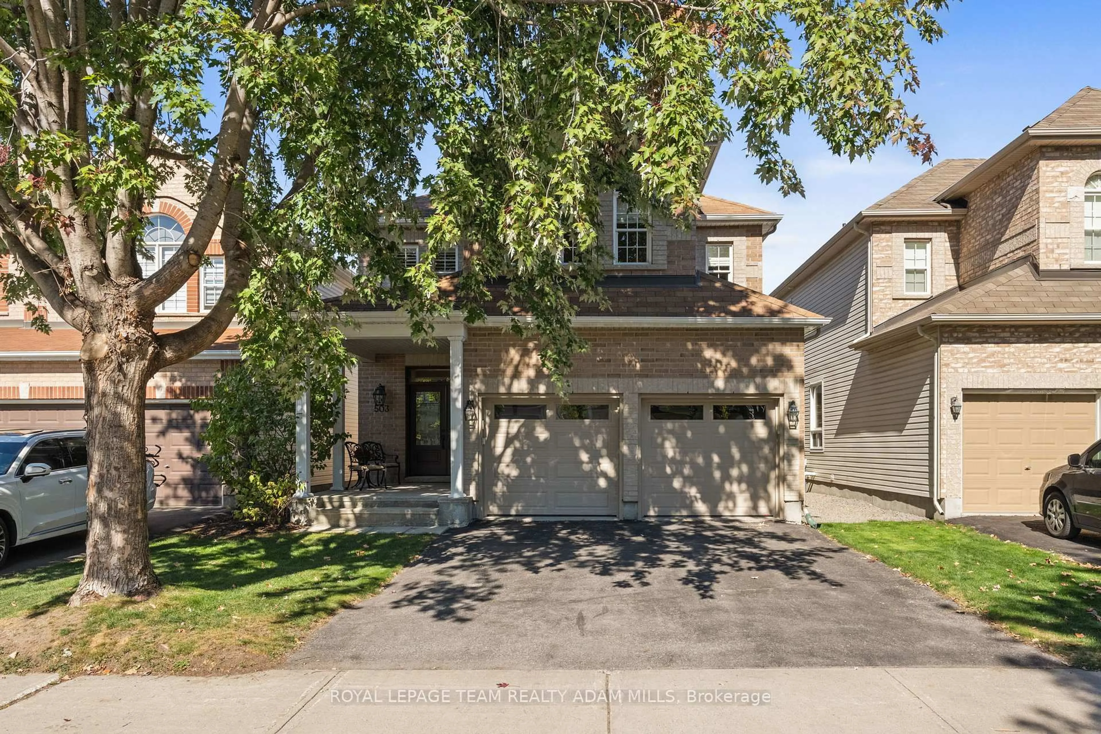 Home with brick exterior material, street for 503 Stonechurch Way, Ottawa Ontario K2J 0C5