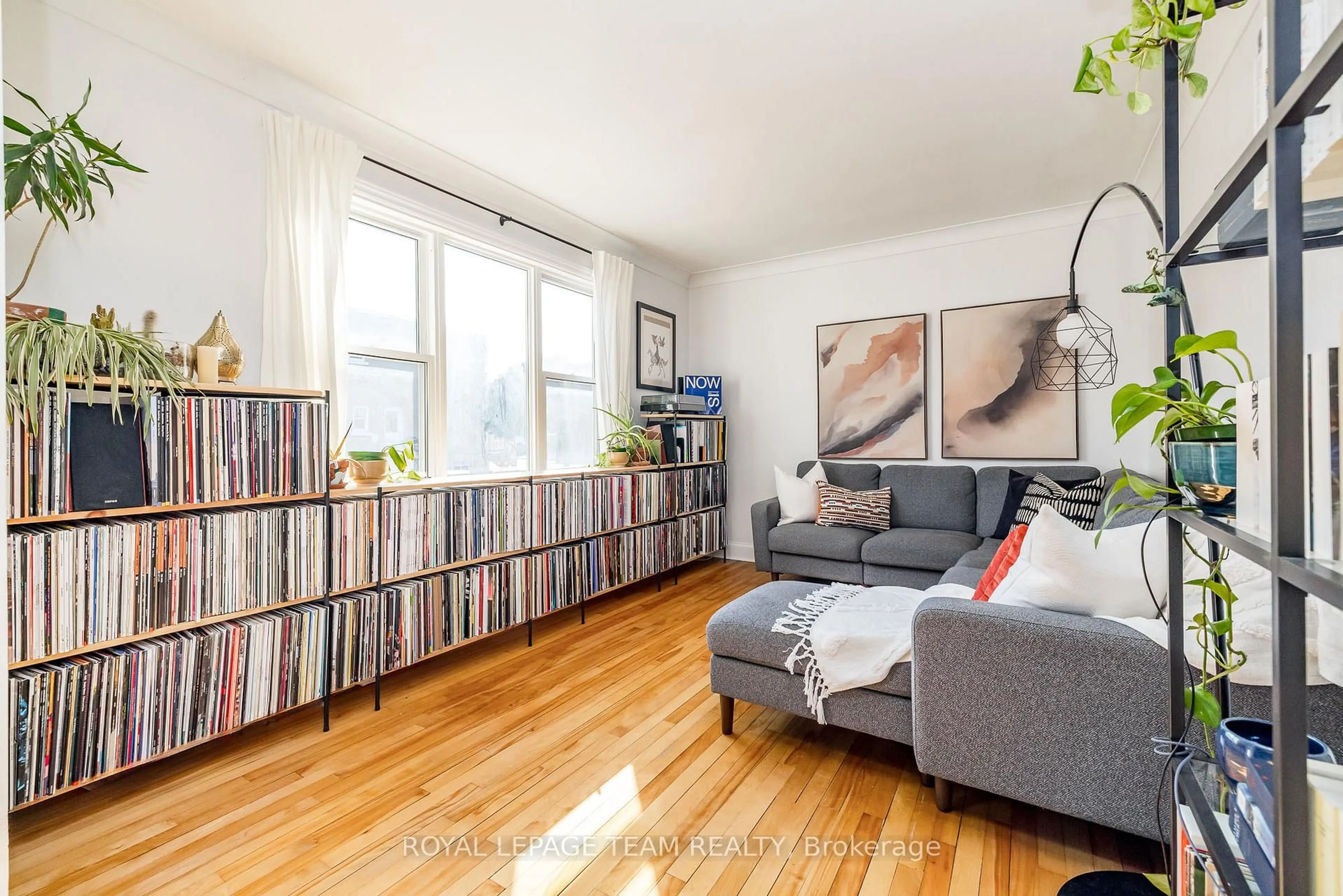 Living room with furniture, wood/laminate floor for 192 Durocher St, Ottawa Ontario K1L 7S3