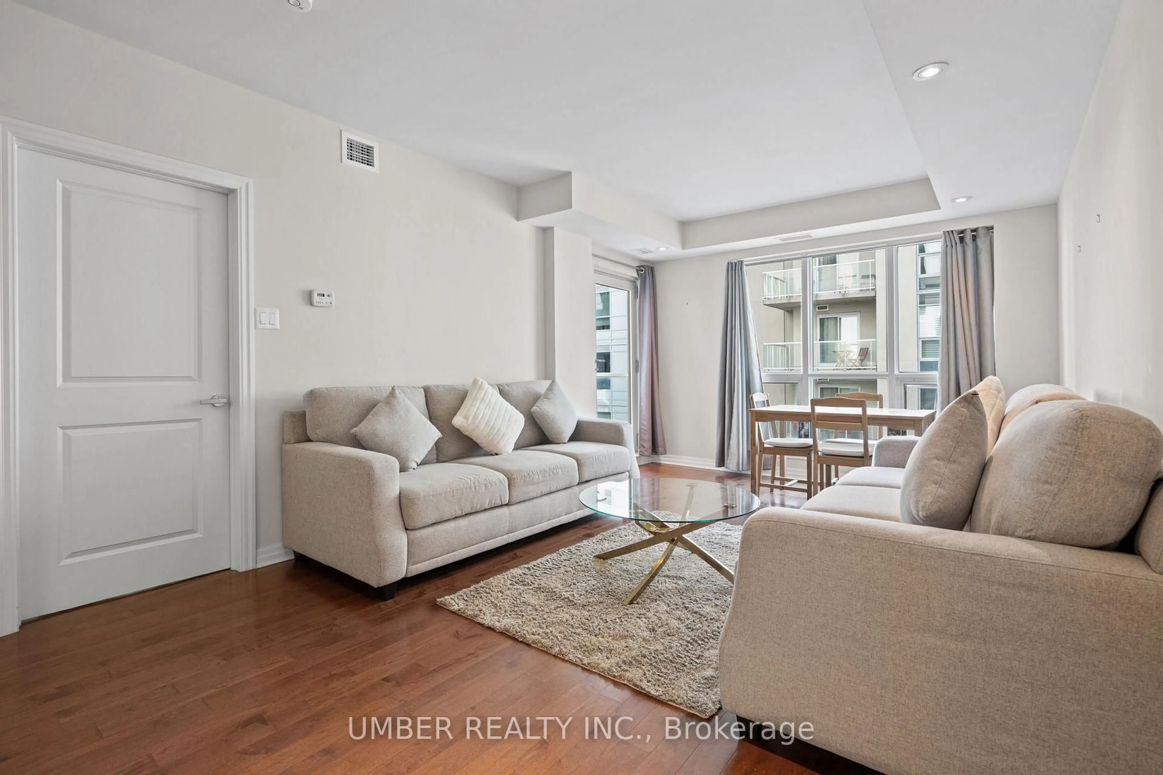 Living room with furniture, unknown for 242 Rideau St #2506, Ottawa Ontario K1N 0B7