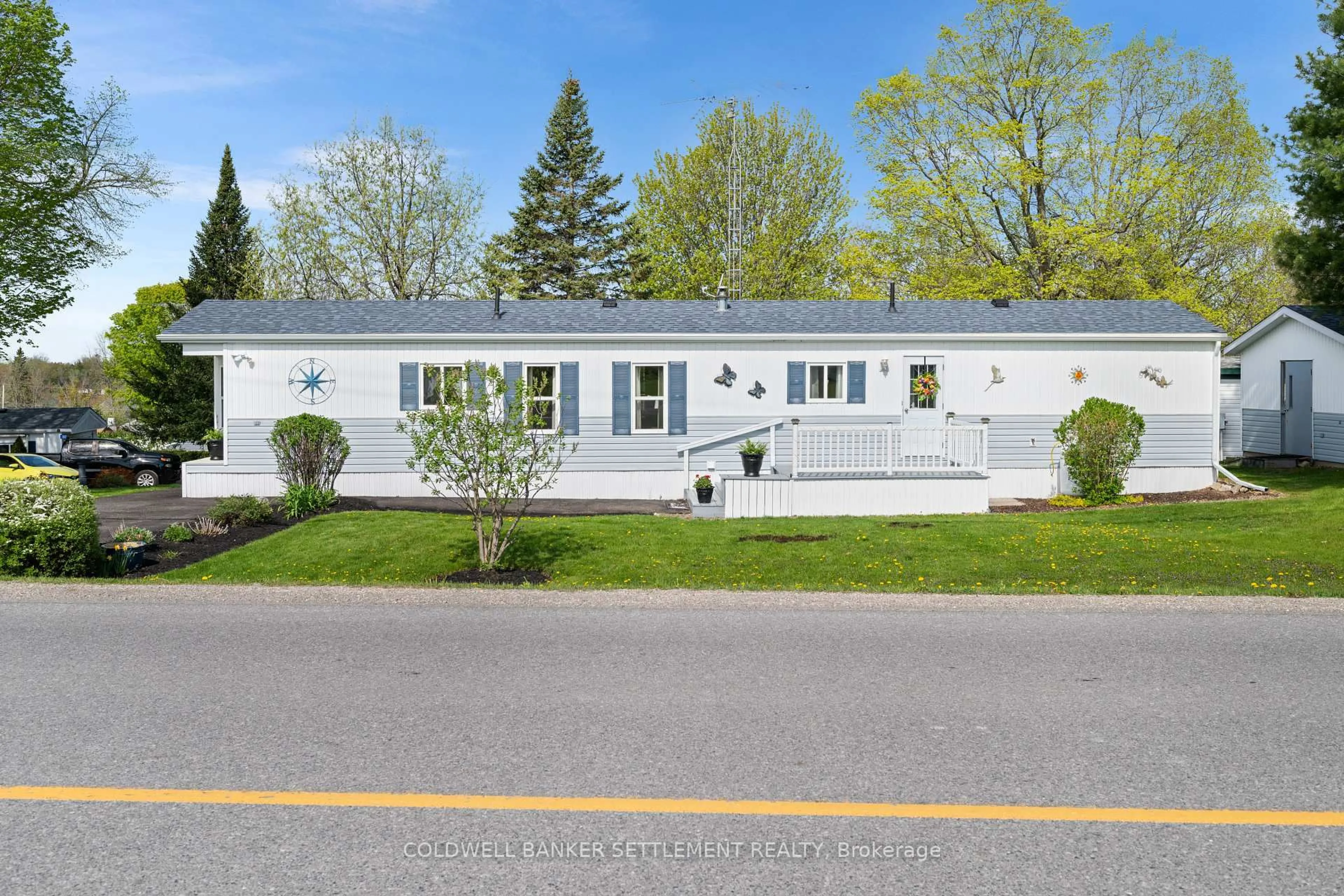 Home with vinyl exterior material, street for 304 Acacia Rd, Perth Ontario K7H 3C7