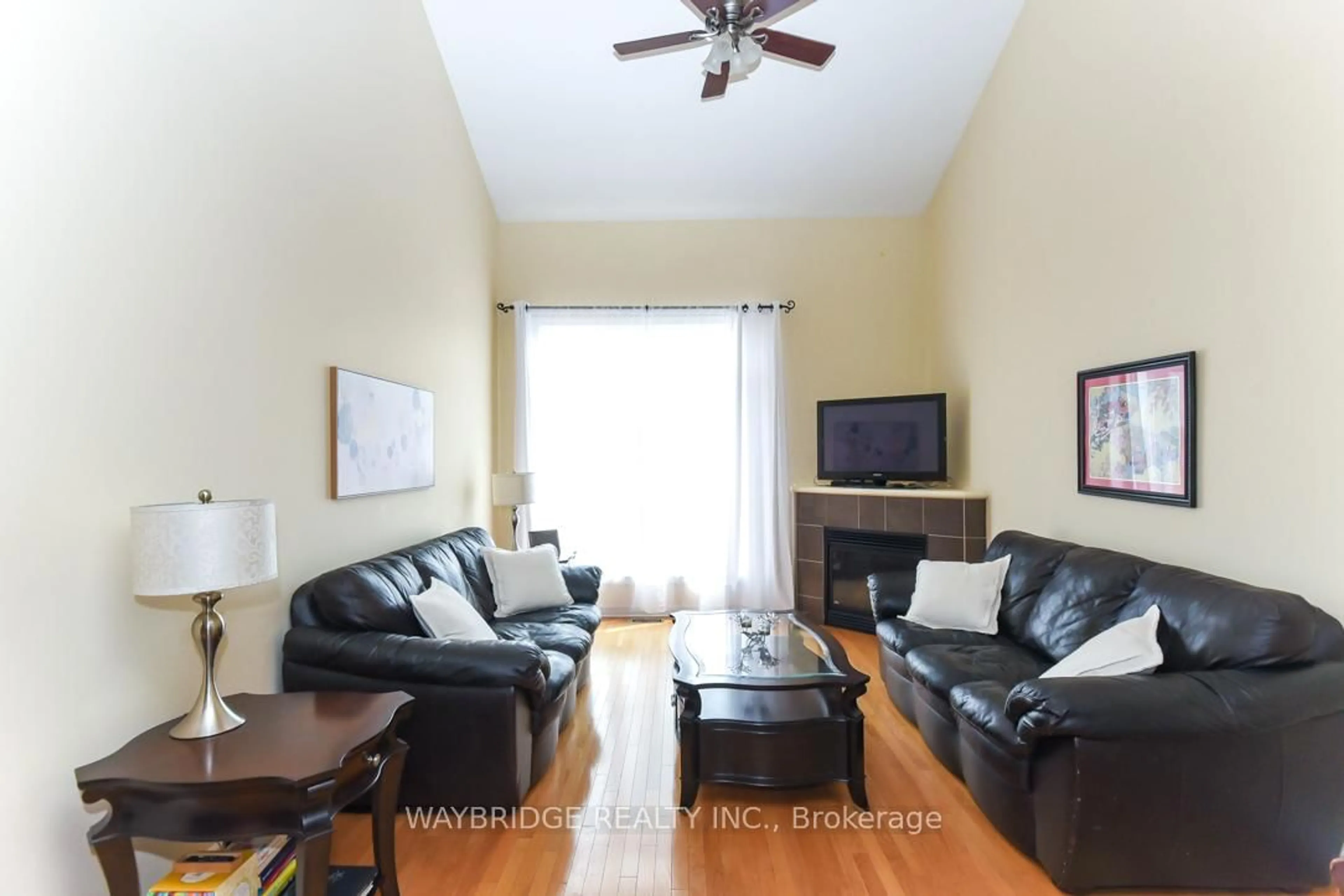 Living room with furniture, wood/laminate floor for 220 Jersey Tea Circ, Ottawa Ontario K1V 2L4