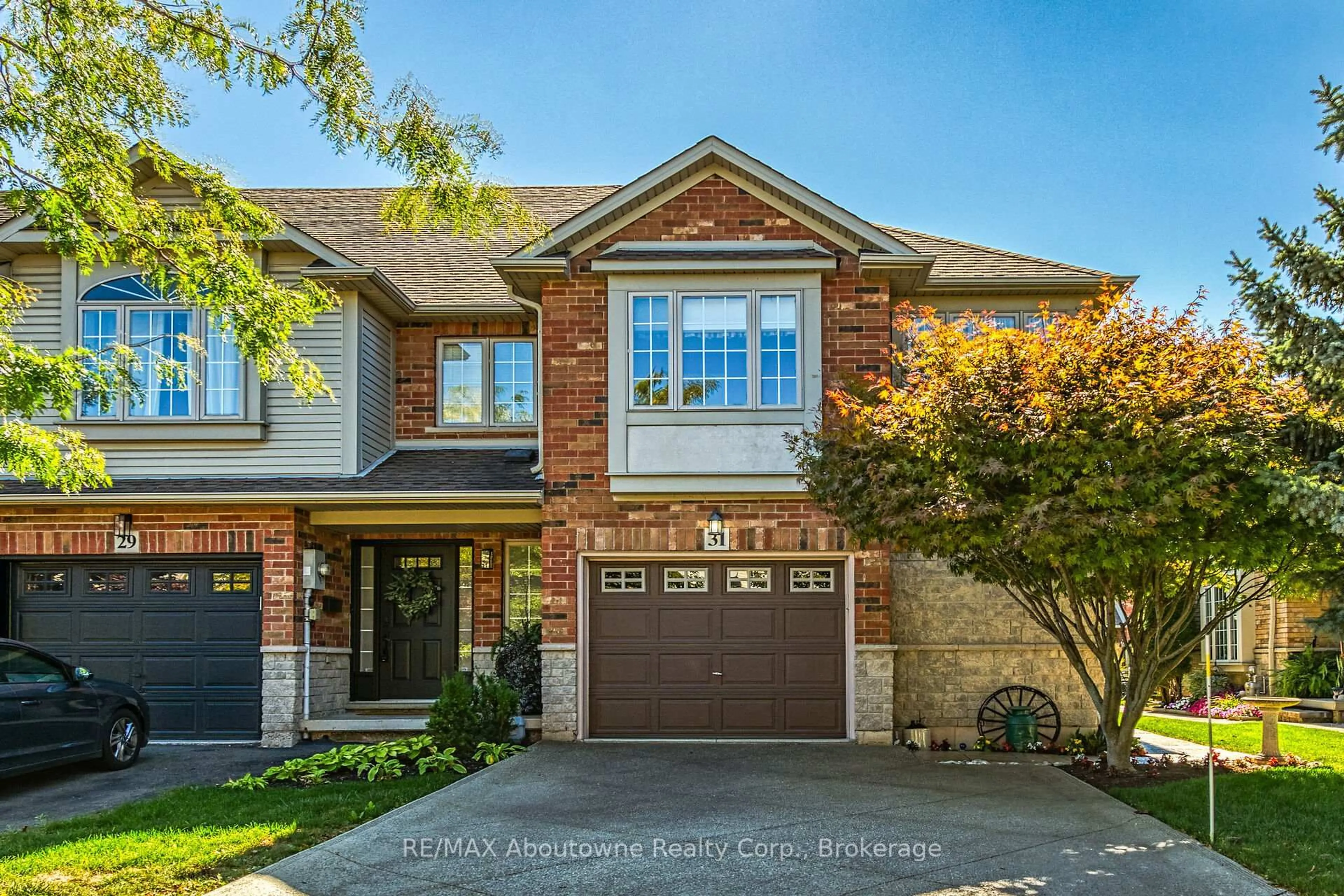 Home with brick exterior material, street for 31 Elderberry Ave, Grimsby Ontario L3M 5R5