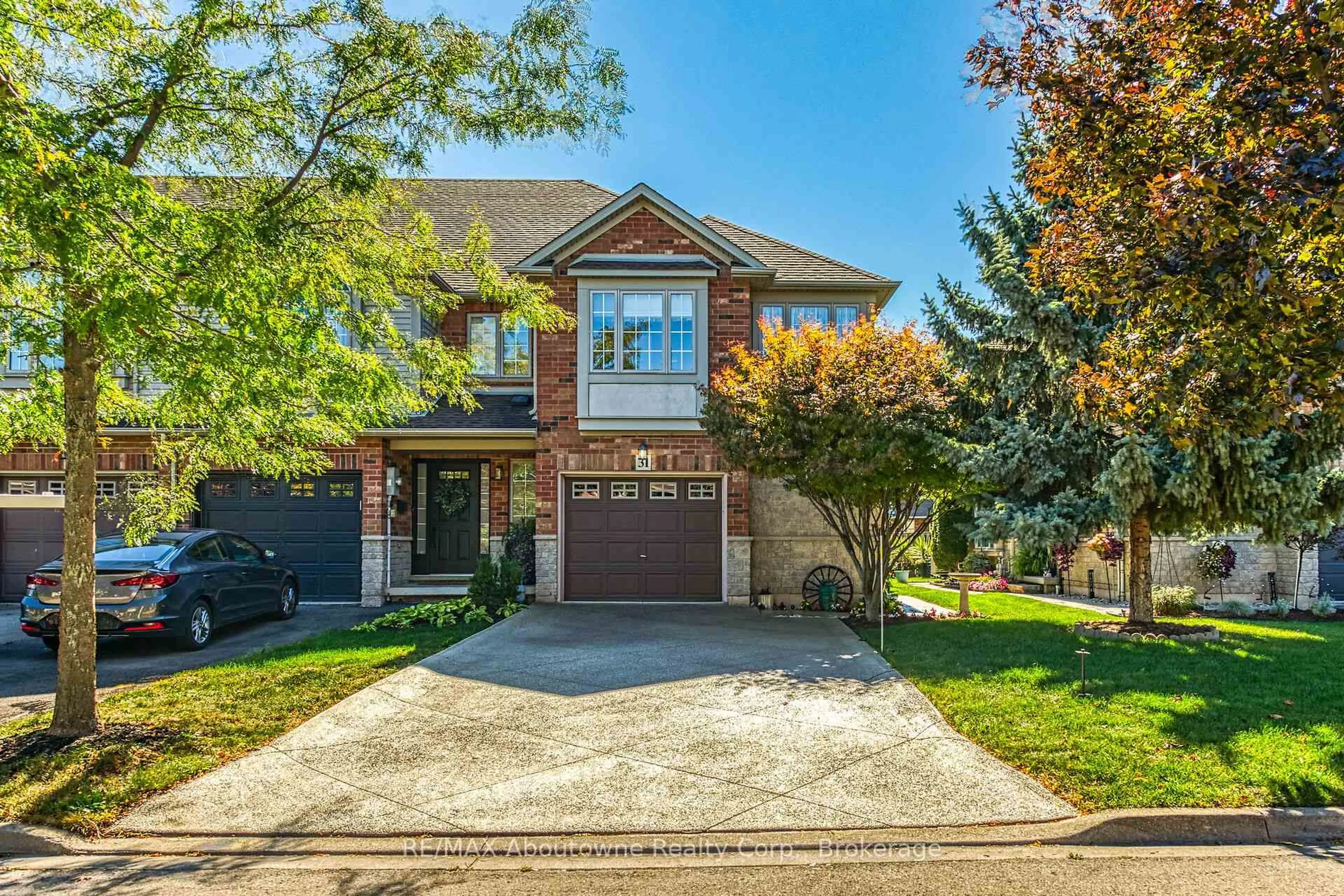 Home with brick exterior material, street for 31 Elderberry Ave, Grimsby Ontario L3M 5R5