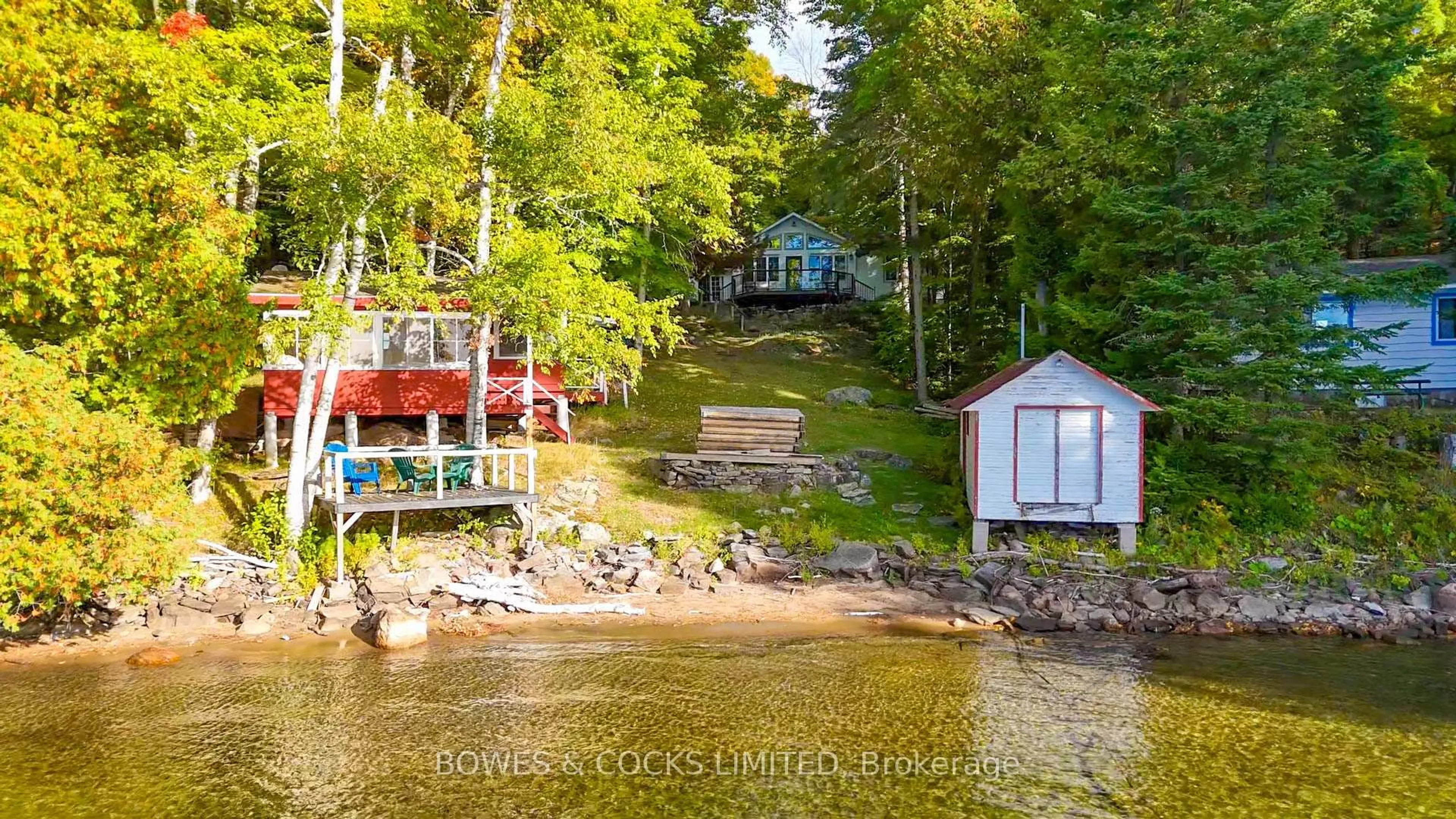 A pic from outside/outdoor area/front of a property/back of a property/a pic from drone, water/lake/river/ocean view for 408 Couchs Rd, North Kawartha Ontario K0L 1A0