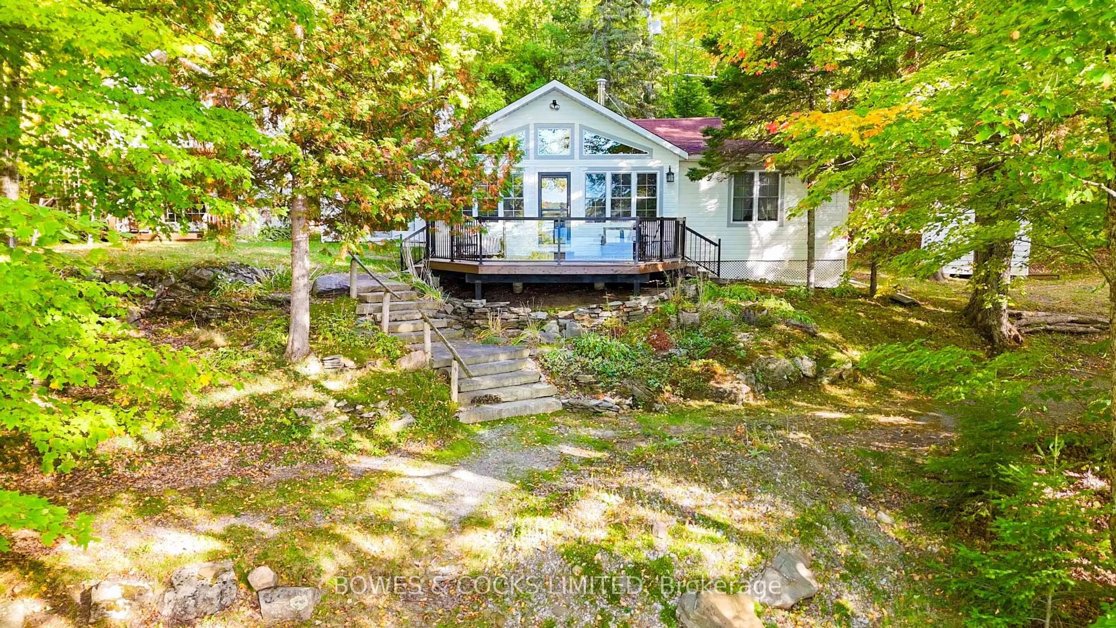 A pic from outside/outdoor area/front of a property/back of a property/a pic from drone, water/lake/river/ocean view for 408 Couchs Rd, North Kawartha Ontario K0L 1A0