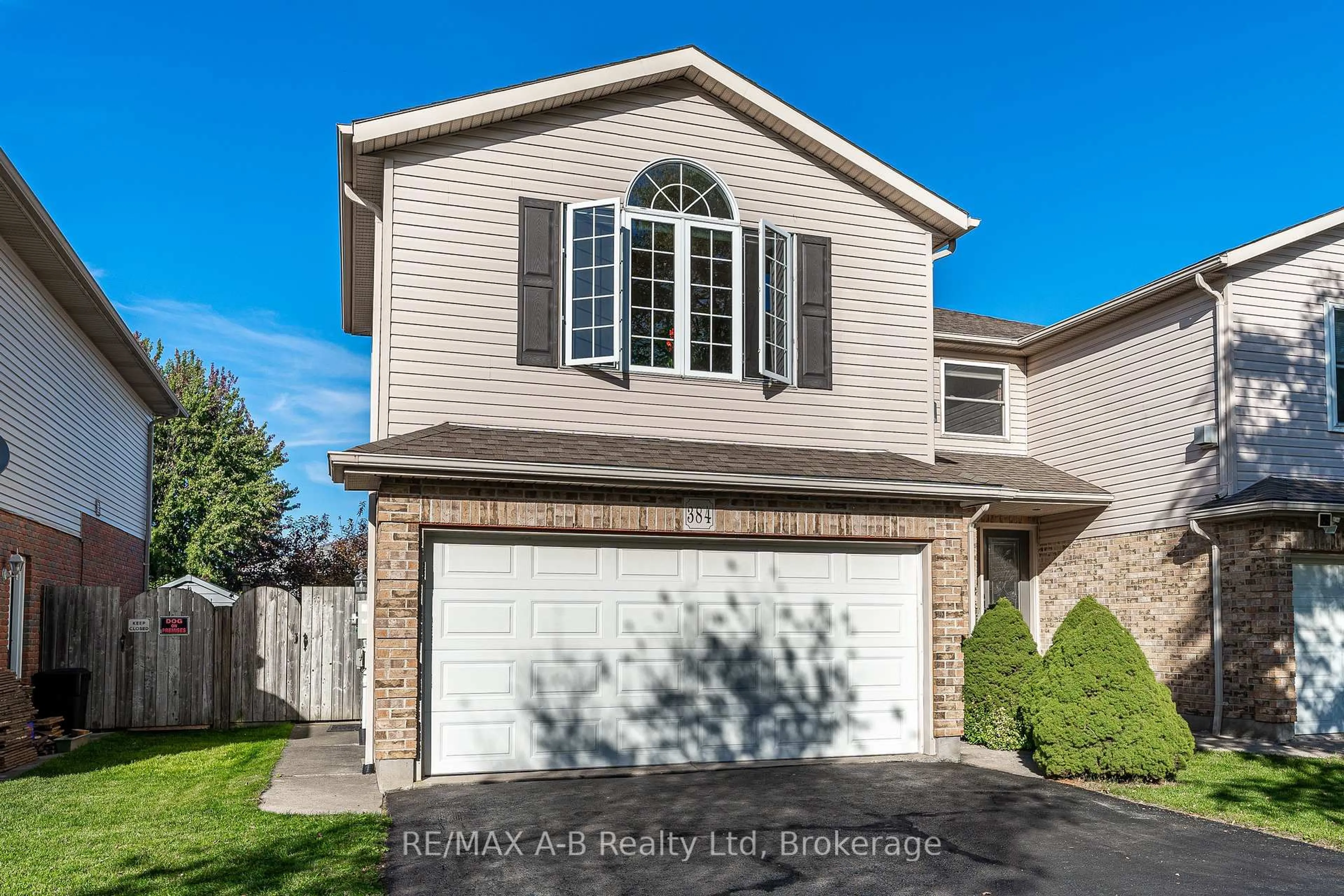 Home with vinyl exterior material, street for 384 Douglas St, Stratford Ontario N5A 7Z7