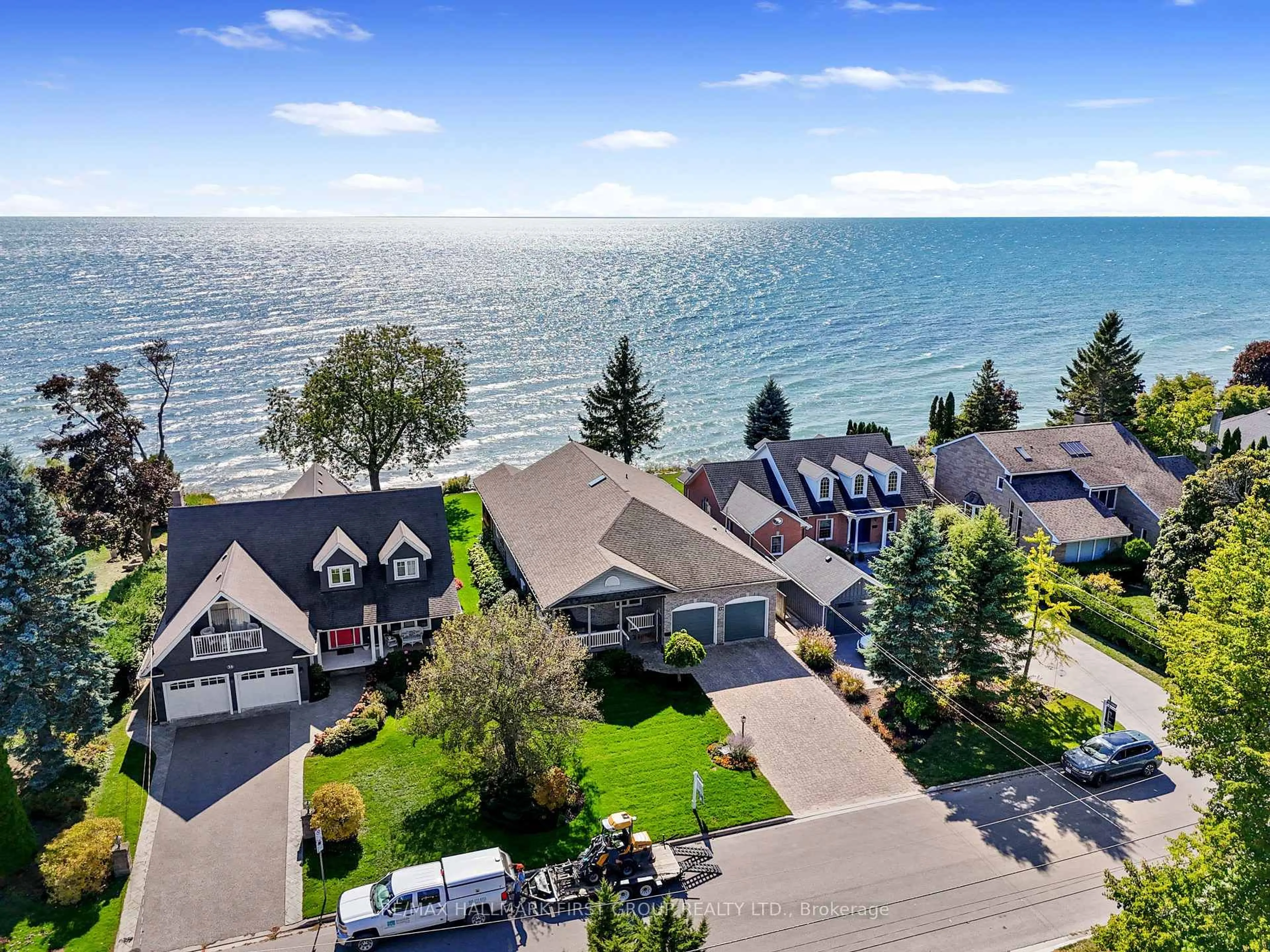 A pic from outside/outdoor area/front of a property/back of a property/a pic from drone, water/lake/river/ocean view for 39 Tremaine Terr, Cobourg Ontario K9A 5A7