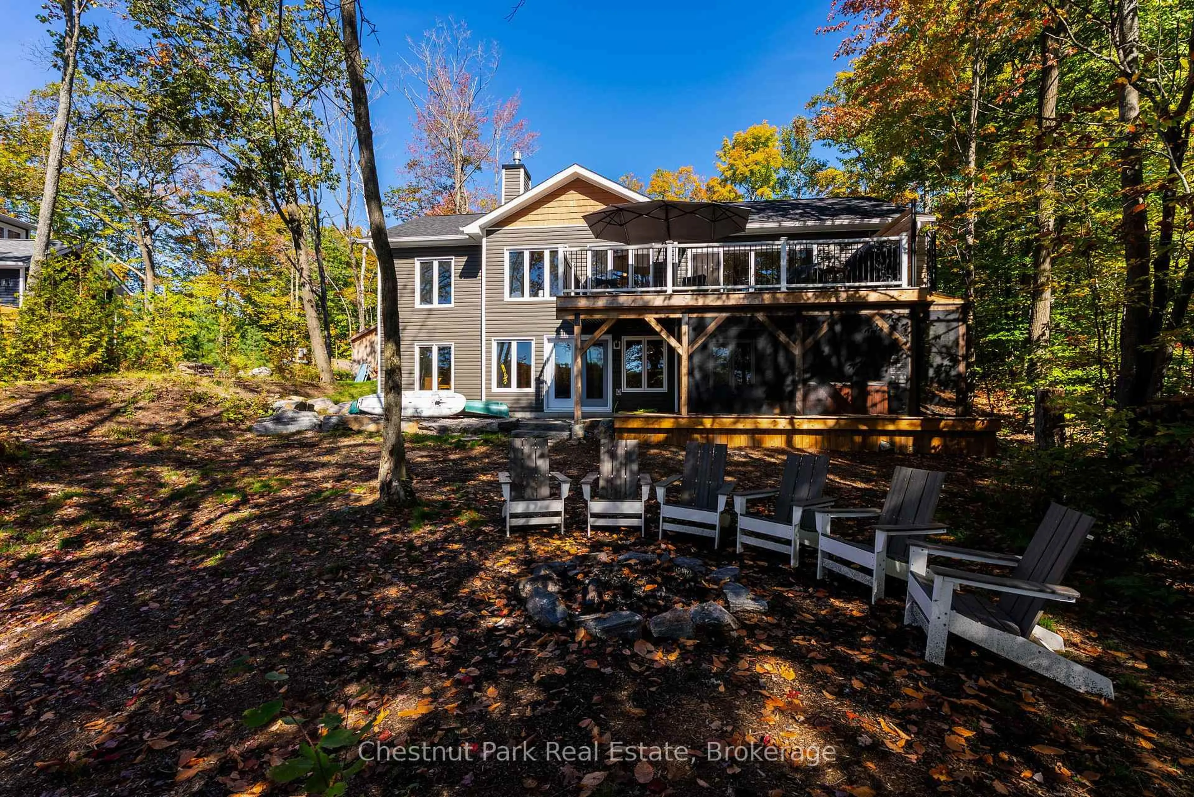A pic from outside/outdoor area/front of a property/back of a property/a pic from drone, water/lake/river/ocean view for 228 Stewart Lake Rd, Georgian Bay Ontario P0C 1H0