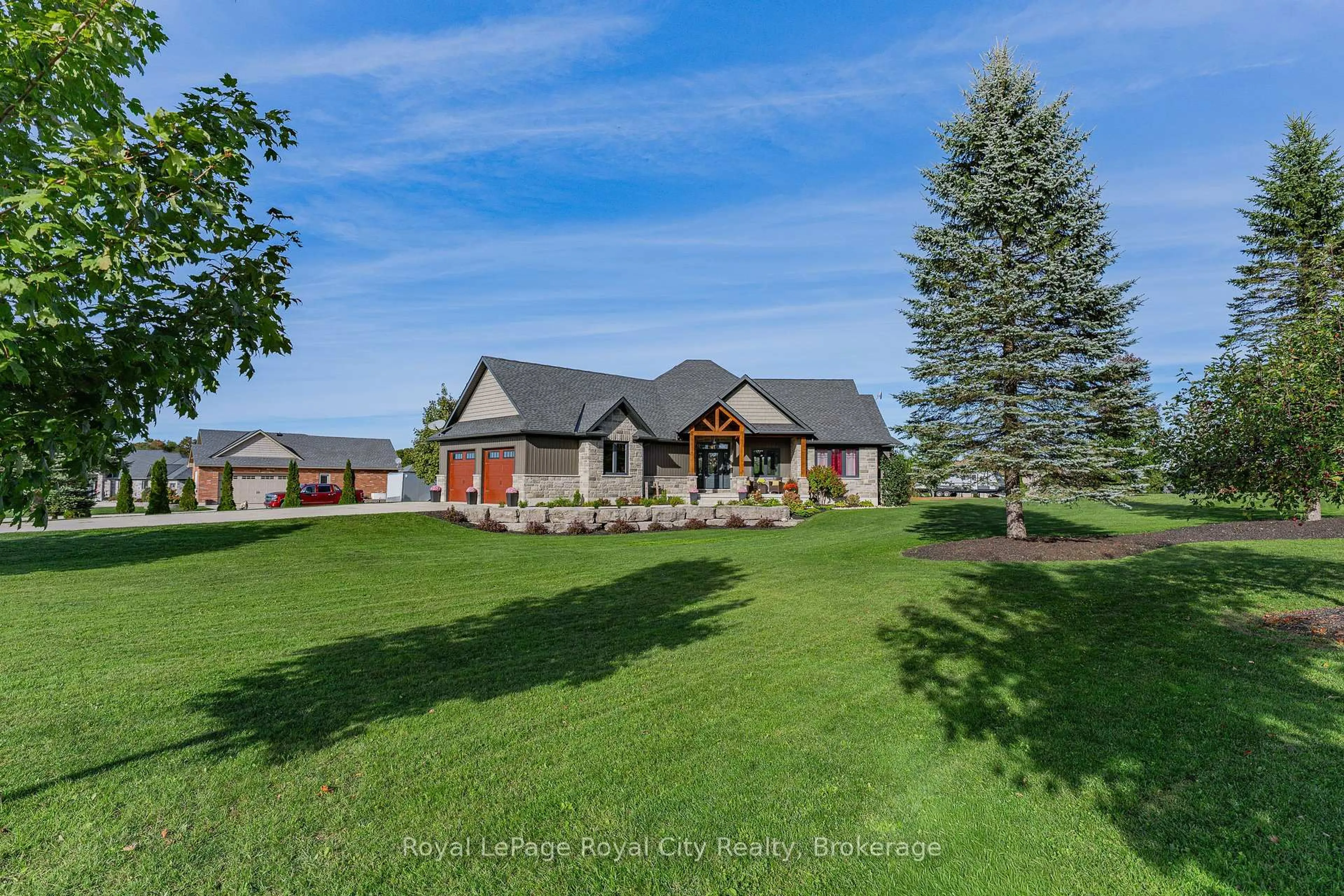 A pic from outside/outdoor area/front of a property/back of a property/a pic from drone, mountain view for 103 Marshall Hts, West Grey Ontario N0G 1R0