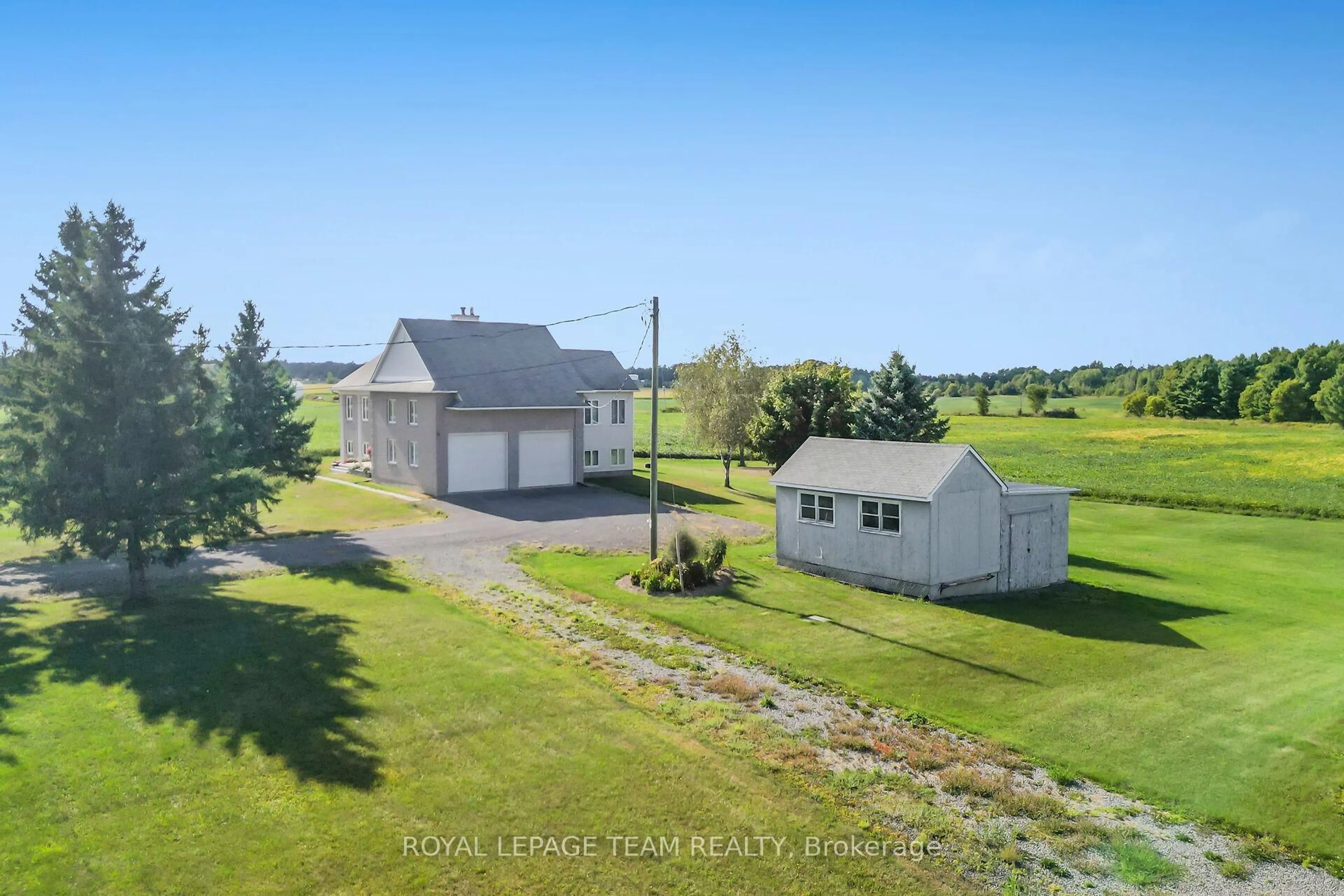 A pic from outside/outdoor area/front of a property/back of a property/a pic from drone, water/lake/river/ocean view for 8665 Russell Rd, Ottawa Ontario K4B 0J7
