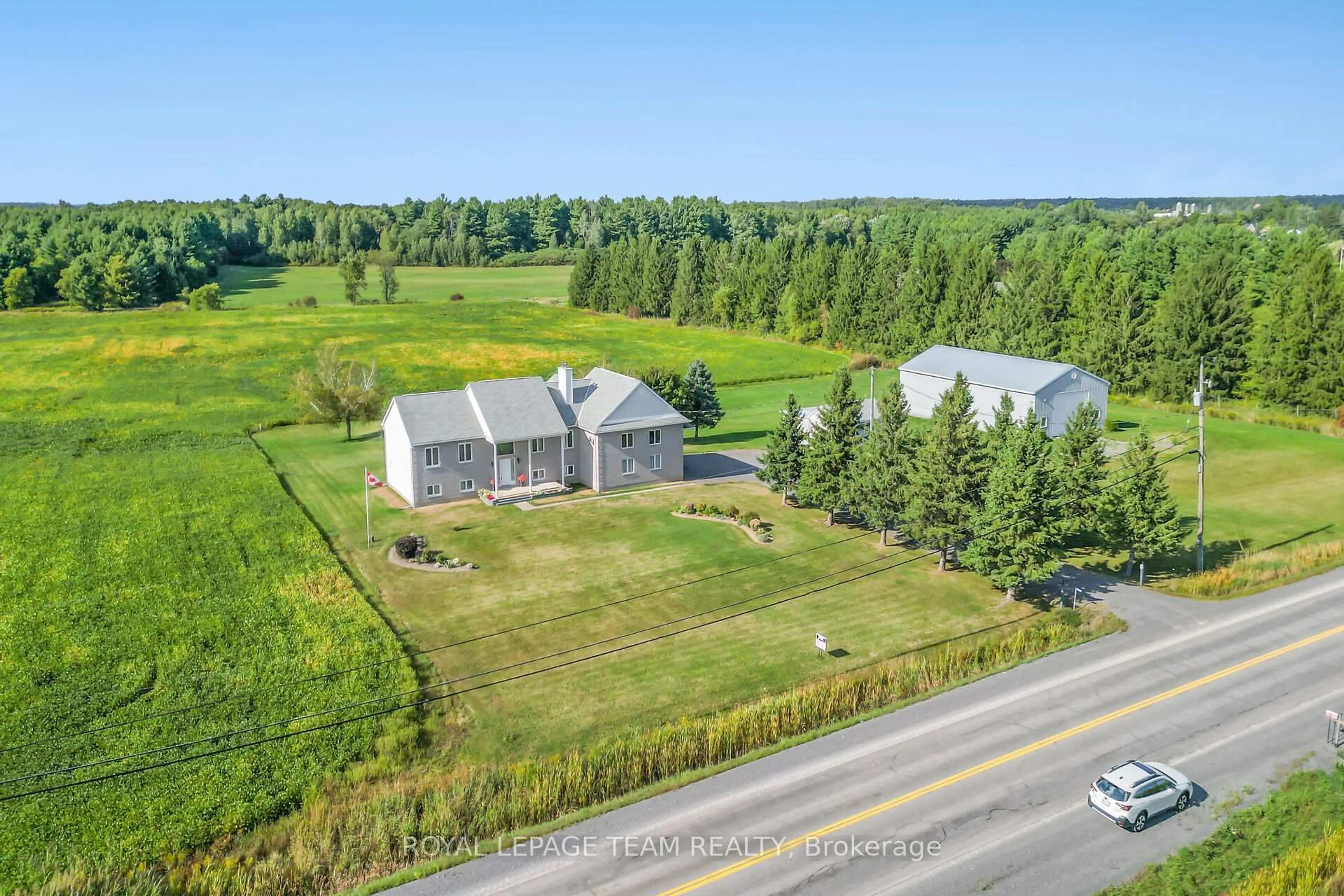 A pic from outside/outdoor area/front of a property/back of a property/a pic from drone, building for 8665 Russell Rd, Ottawa Ontario K4B 0J7