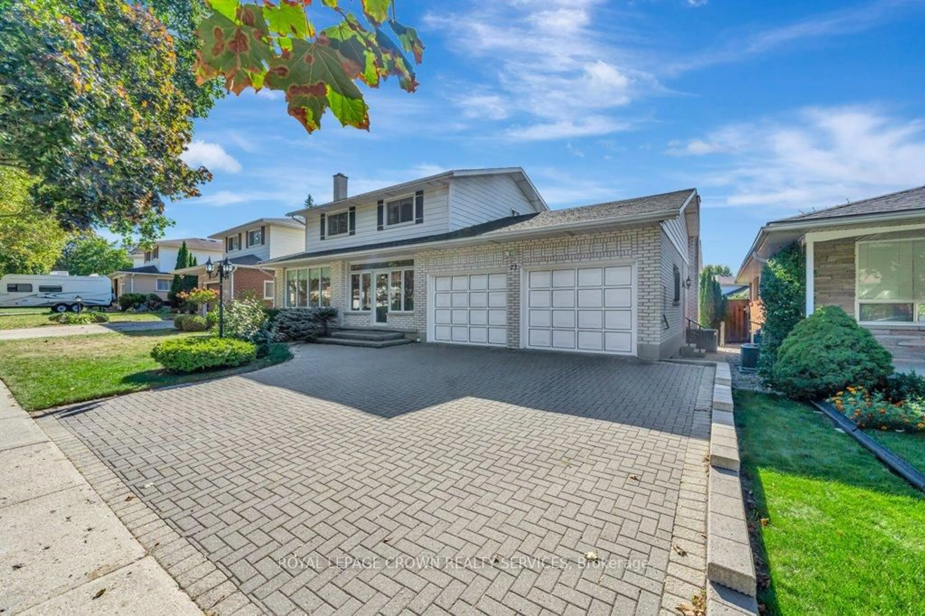 Home with brick exterior material, street for 73 Champlain Cres, Kitchener Ontario N2B 2Y7
