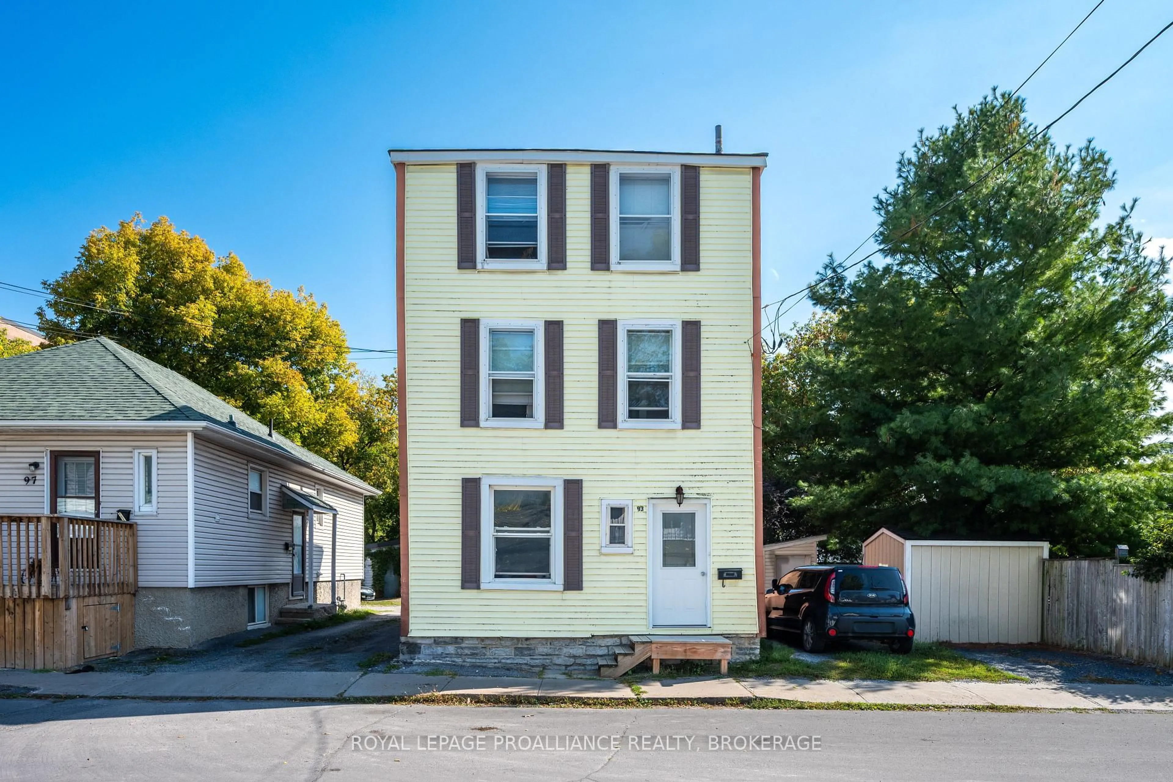 Home with vinyl exterior material, street for 93 Cherry St, Kingston Ontario K7K 3W7