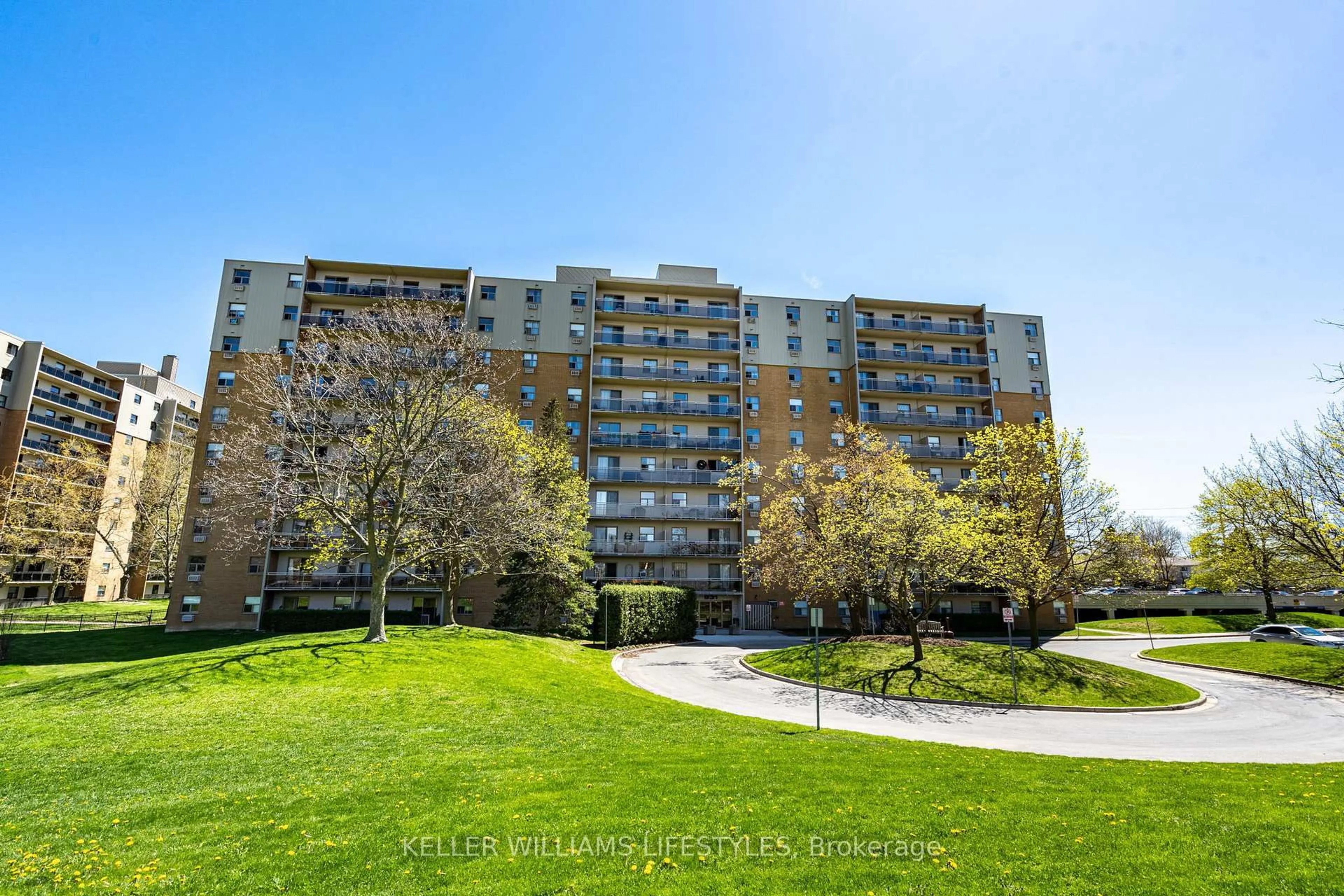 A pic from outside/outdoor area/front of a property/back of a property/a pic from drone, unknown for 931 Wonderland Rd #511, London South Ontario N6K 2X6