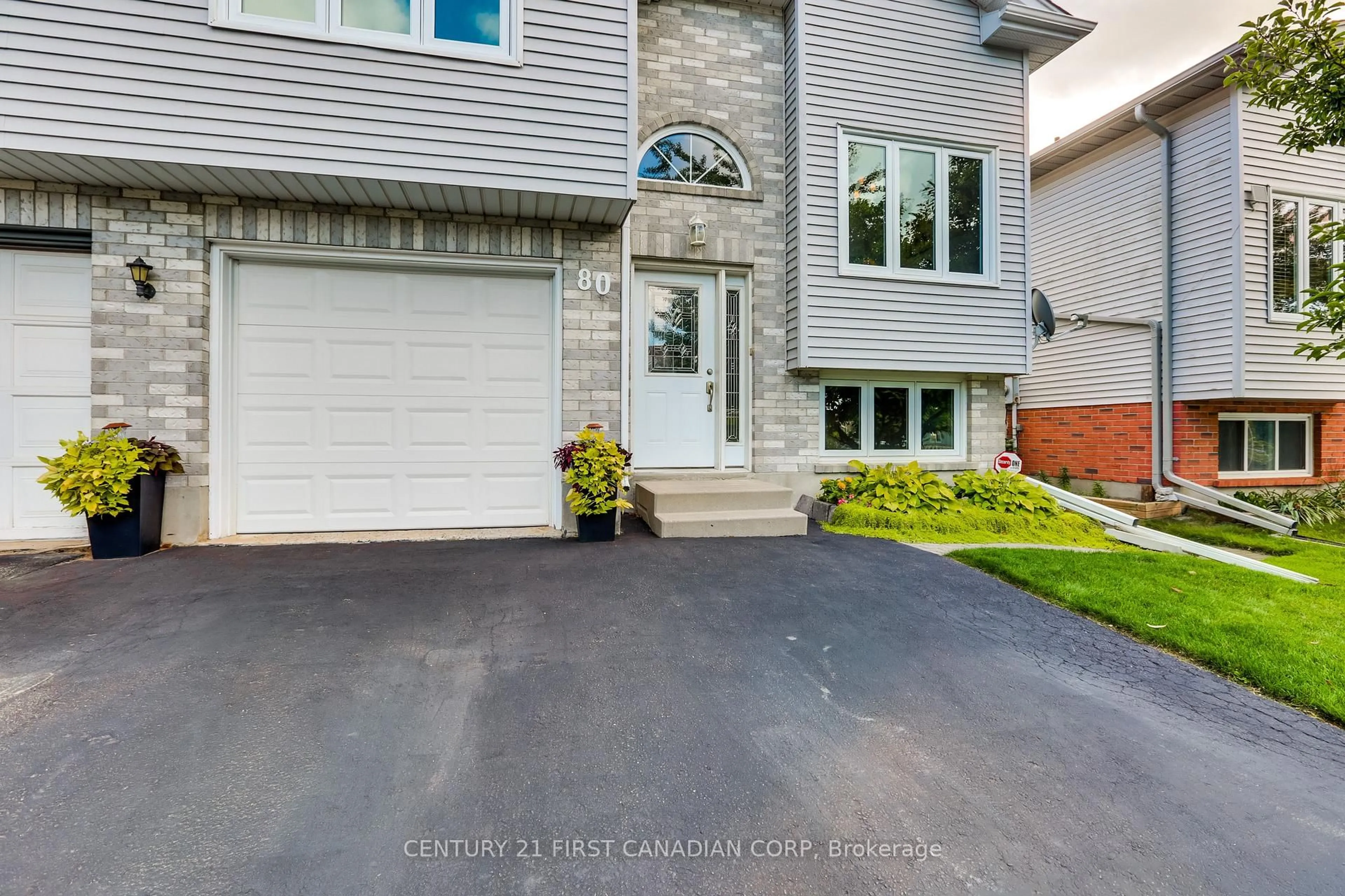 Home with vinyl exterior material, street for 80 Tanner Dr, London East Ontario N5W 6B5