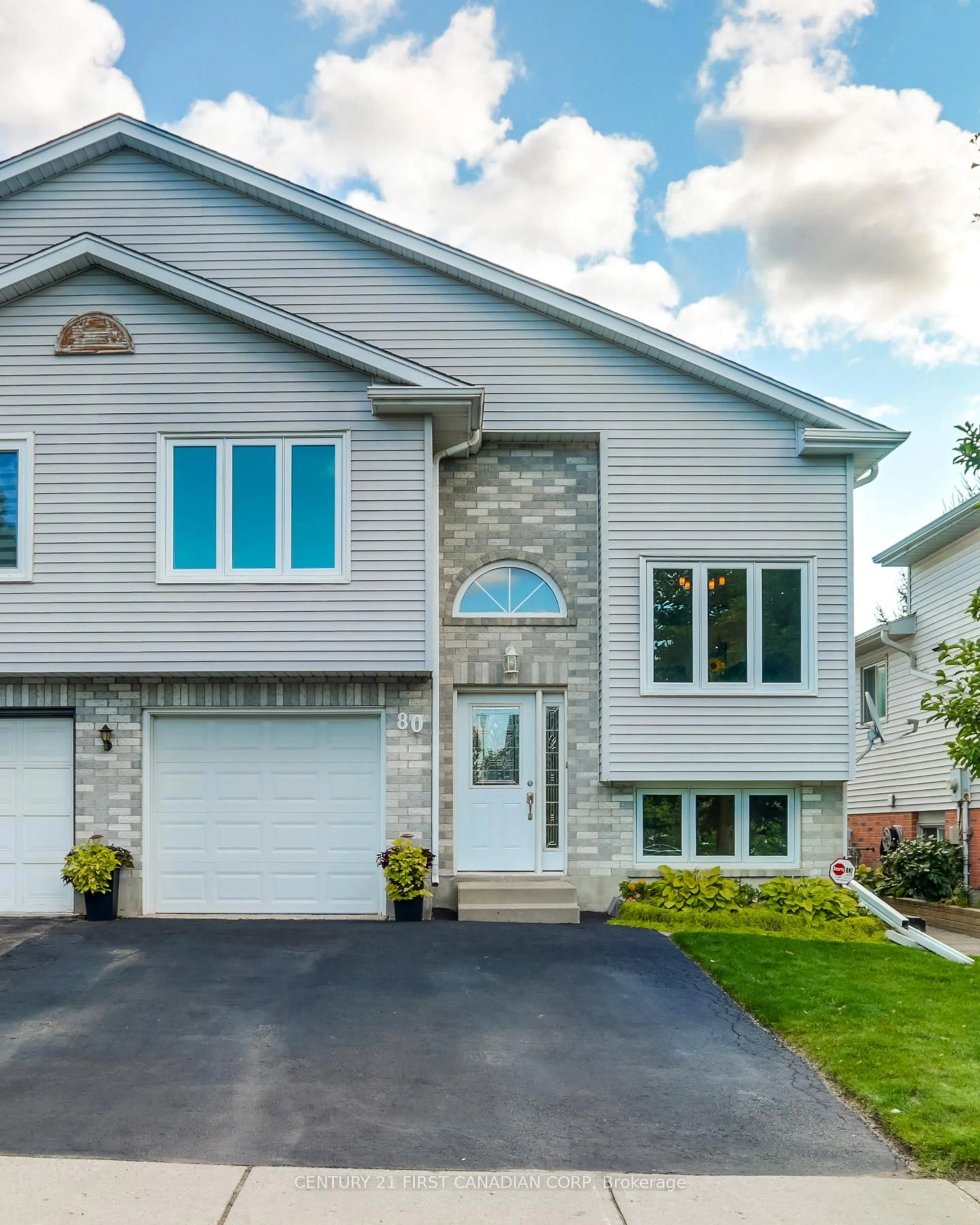 Home with vinyl exterior material, street for 80 Tanner Dr, London East Ontario N5W 6B5