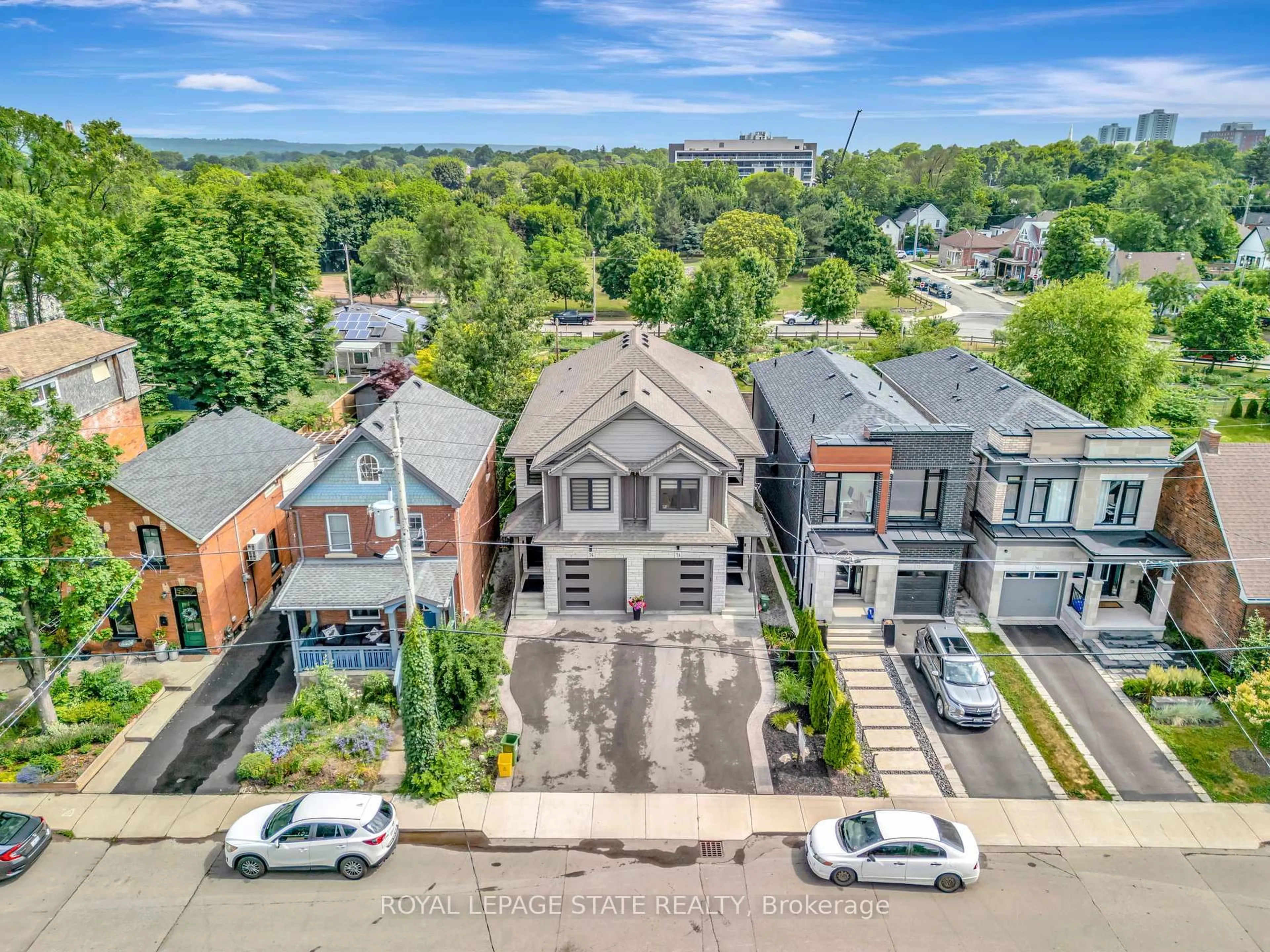 A pic from outside/outdoor area/front of a property/back of a property/a pic from drone, street for 74 Melbourne St, Hamilton Ontario L8P 2A6