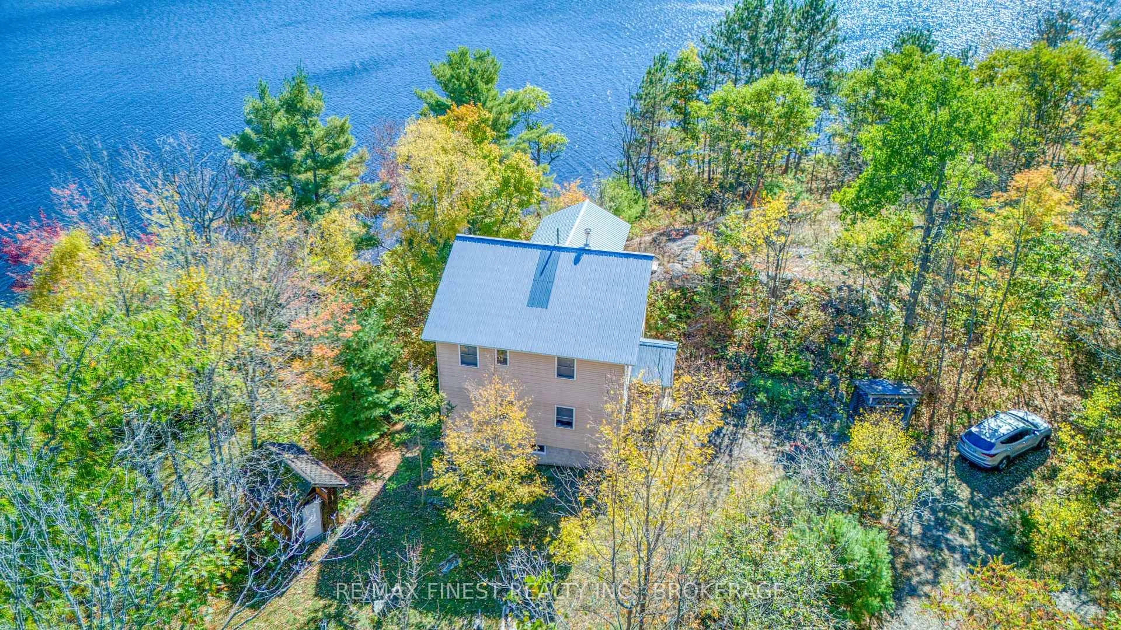 A pic from outside/outdoor area/front of a property/back of a property/a pic from drone, water/lake/river/ocean view for 1652 Baker Valley Rd, Arden Ontario K0H 1B0