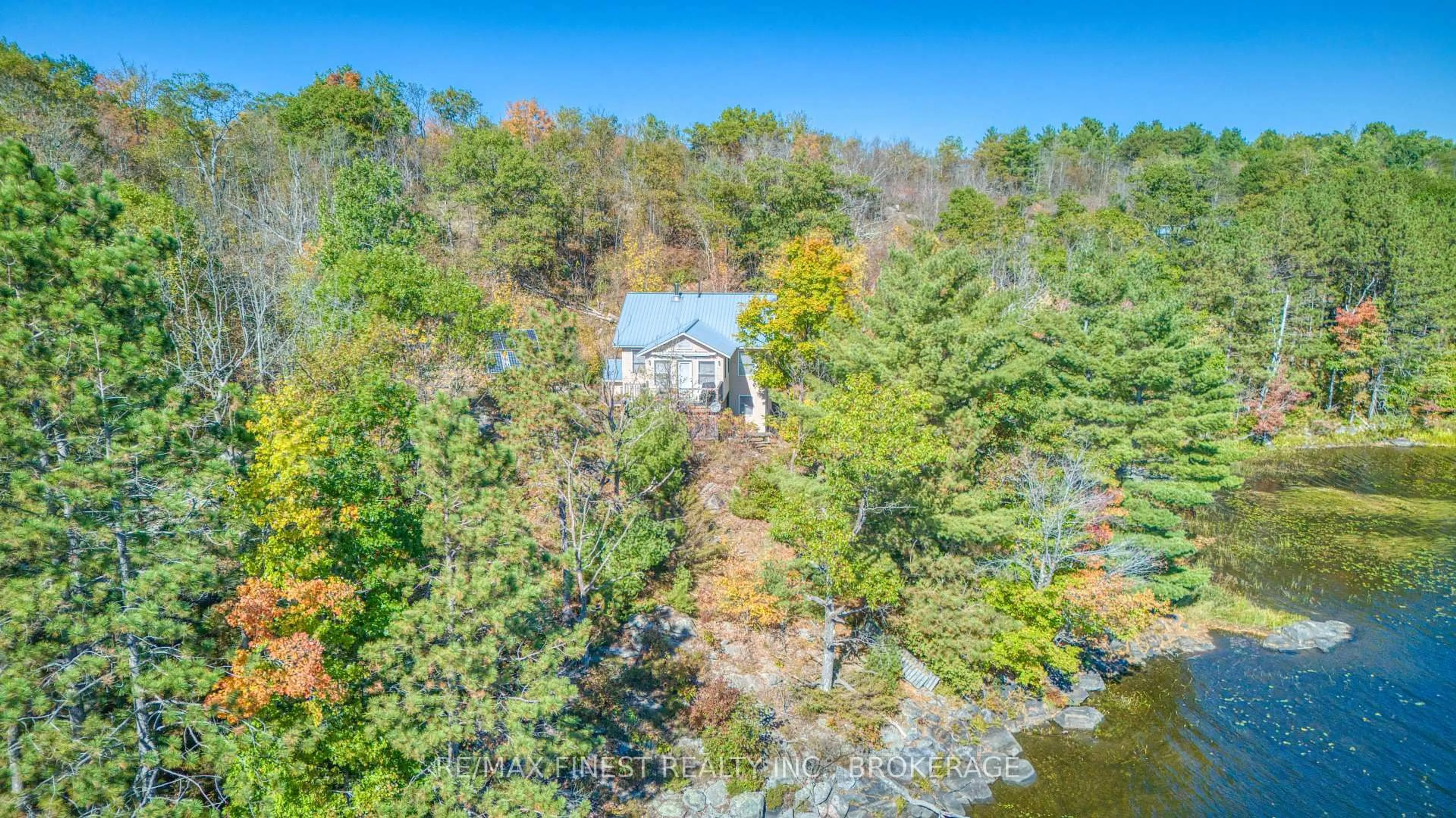 A pic from outside/outdoor area/front of a property/back of a property/a pic from drone, water/lake/river/ocean view for 1652 Baker Valley Rd, Arden Ontario K0H 1B0