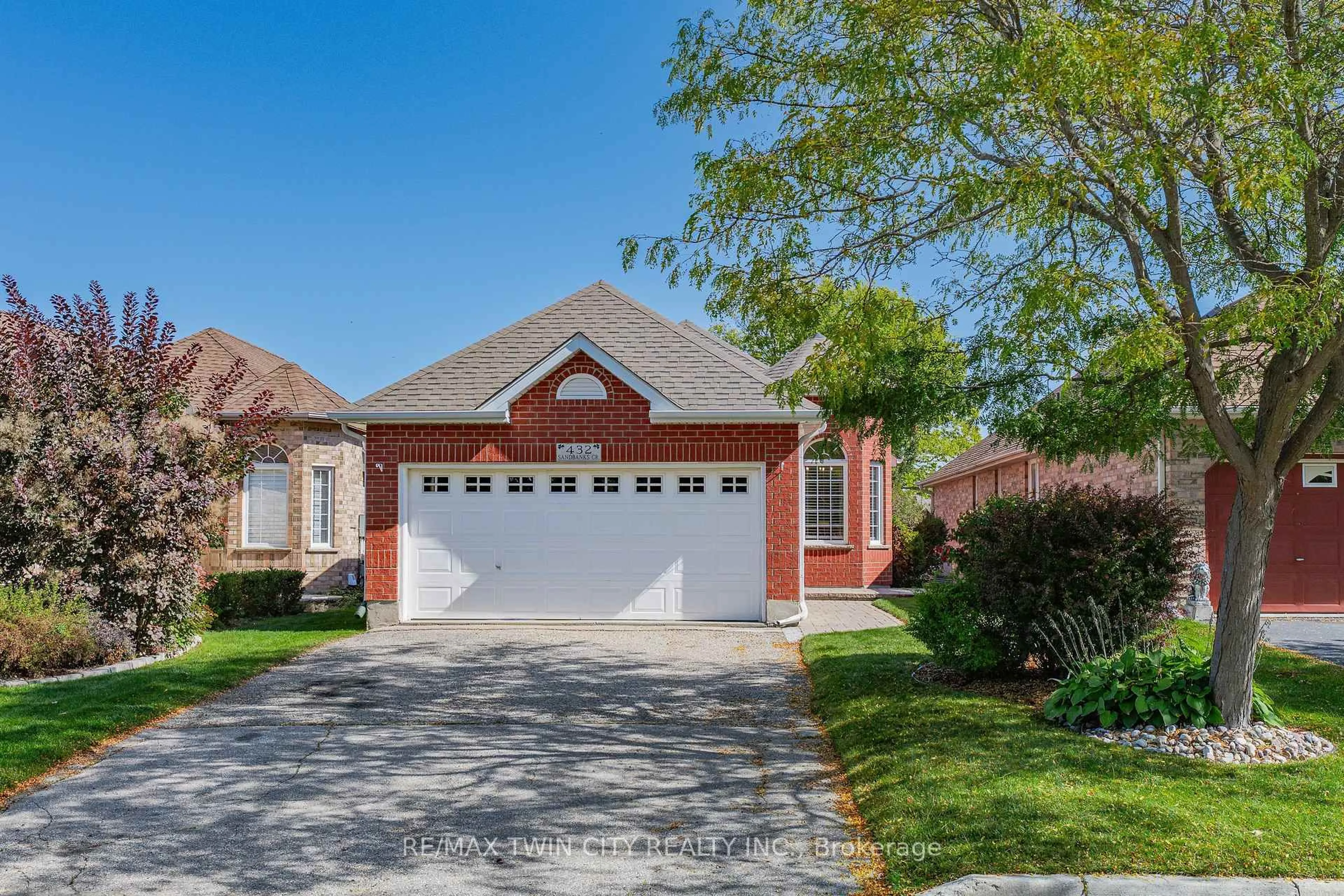 Home with brick exterior material, street for 432 Sandbanks Cres, Waterloo Ontario N2V 2J1