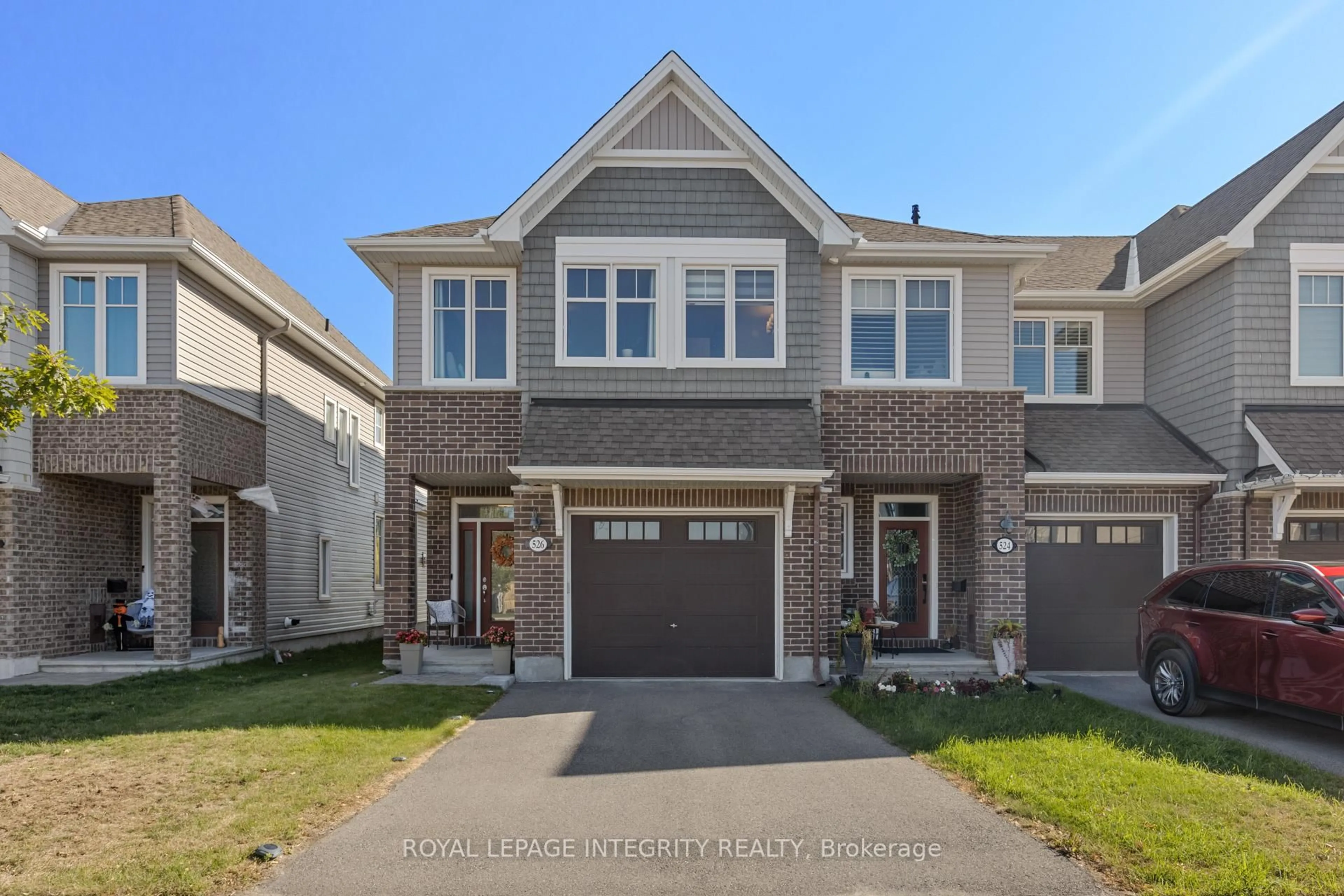 Home with brick exterior material, street for 526 Jackdaw Ave, Ottawa Ontario K2J 6M8