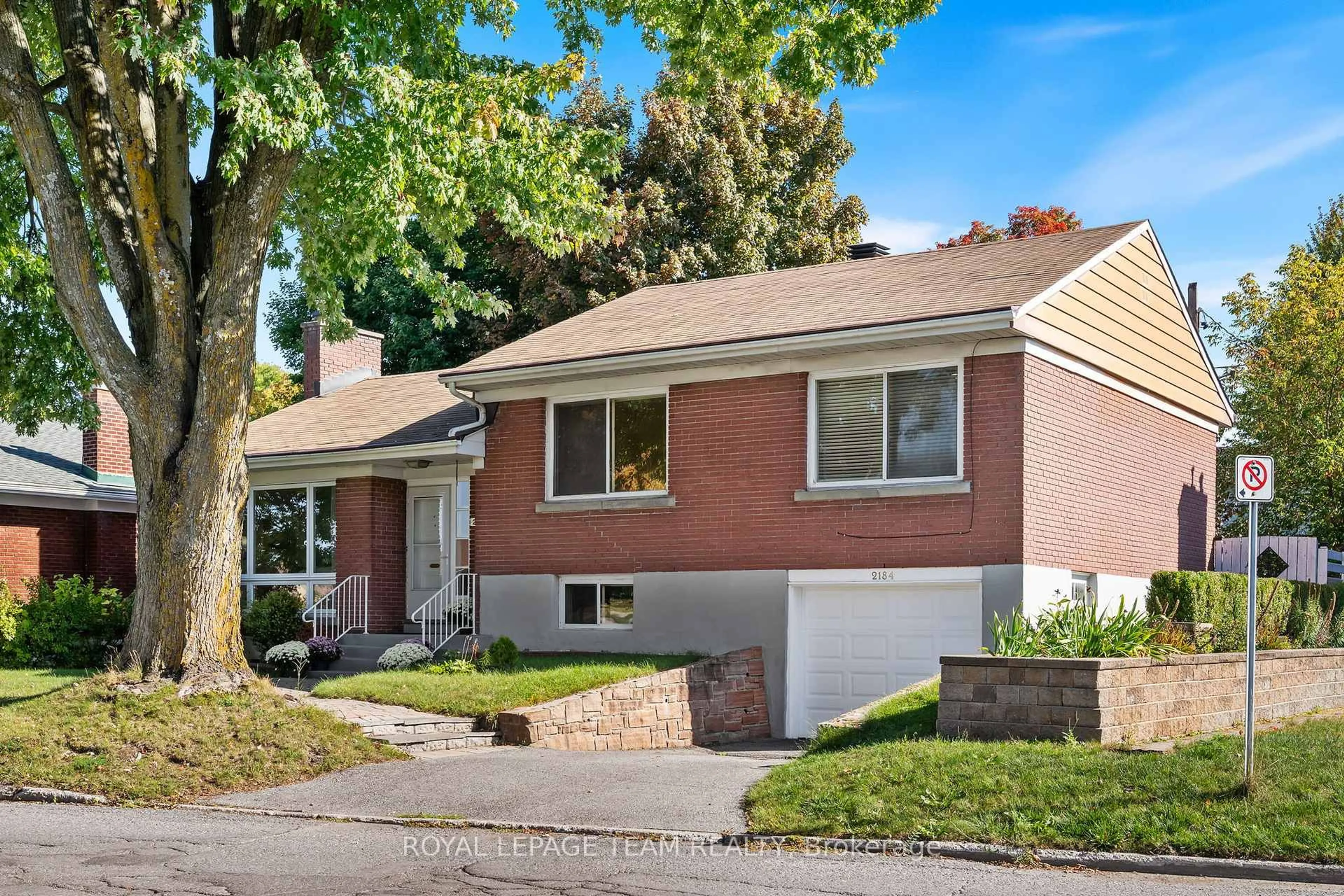 Home with brick exterior material, street for 2184 Iris St, Ottawa Ontario K2C 1B3