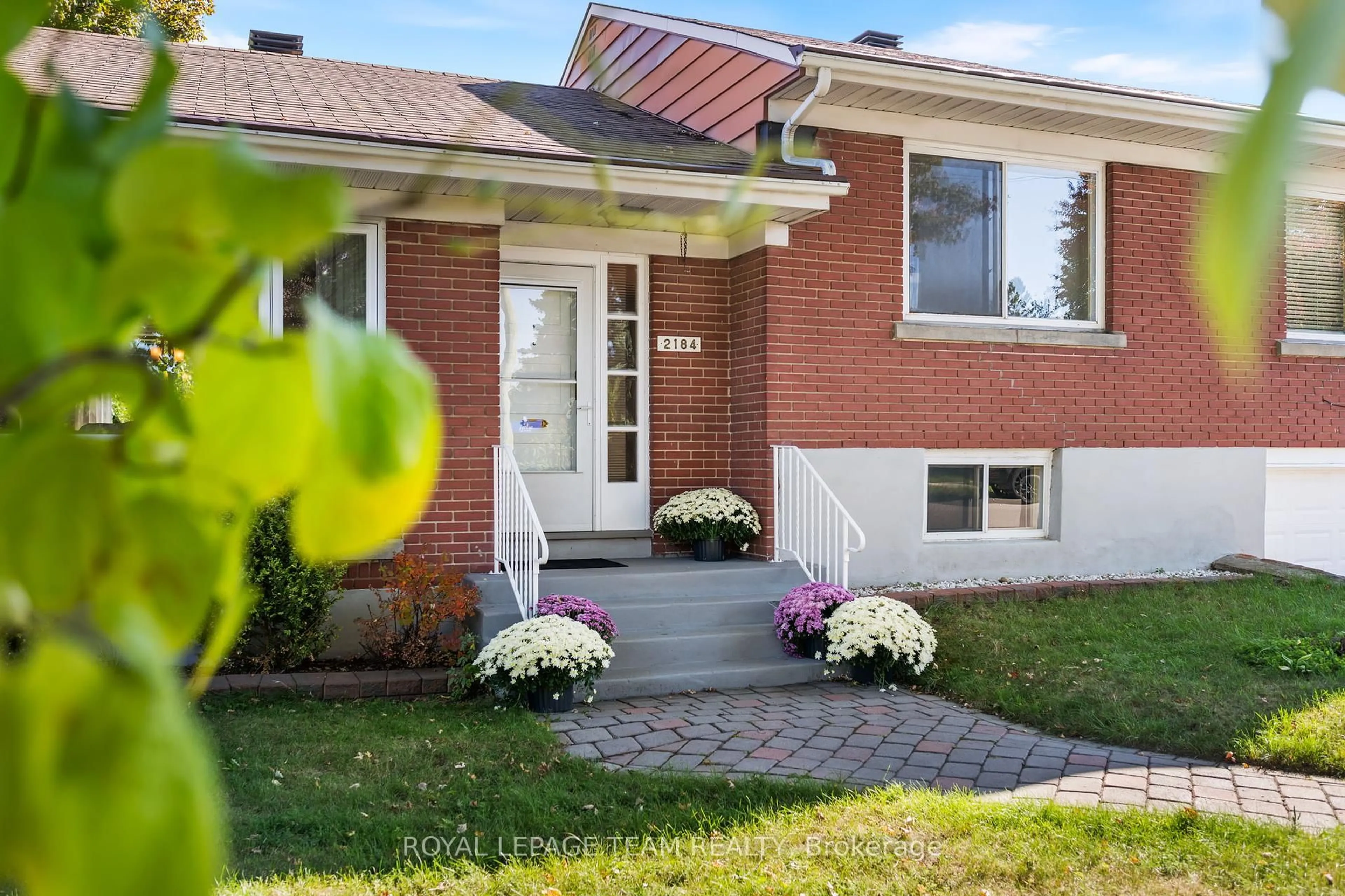 Home with brick exterior material, street for 2184 Iris St, Ottawa Ontario K2C 1B3