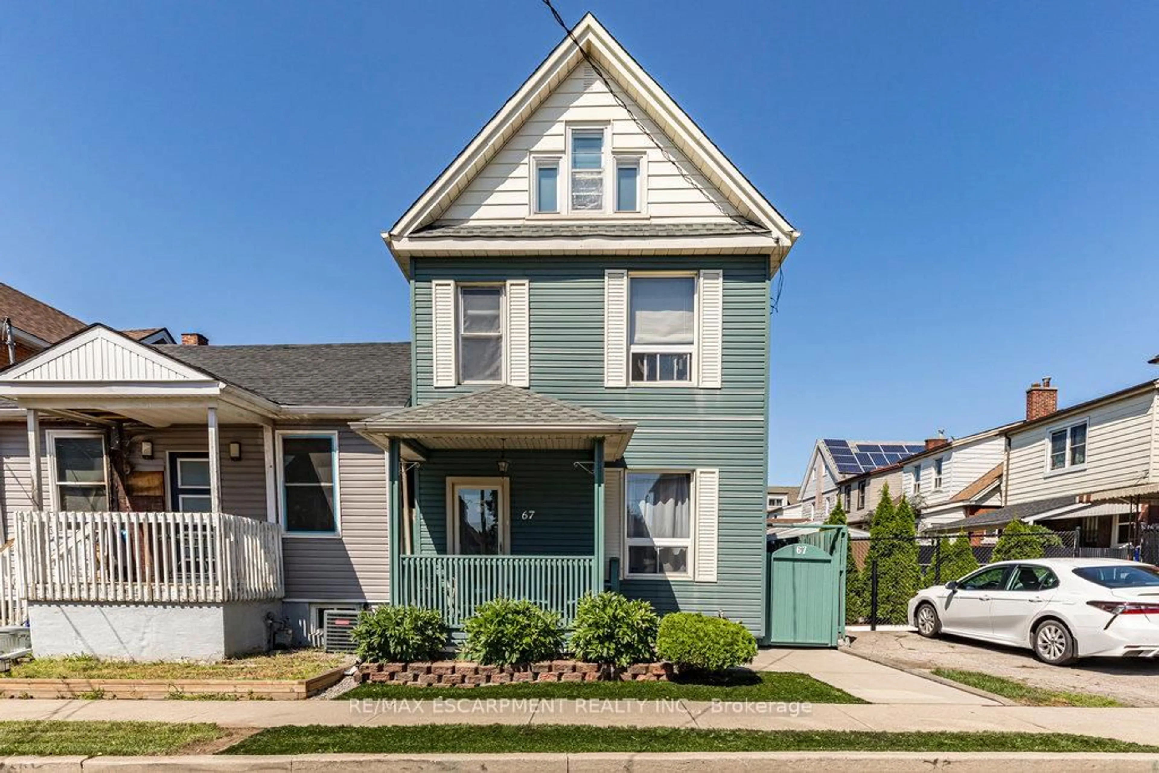 Home with vinyl exterior material, street for 67 Beechwood Ave, Hamilton Ontario L8L 2S5